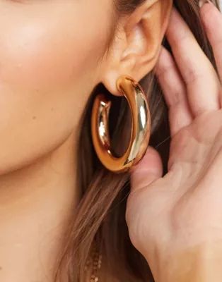 ASOS DESIGN hoop earrings in 50mm chubby design in gold tone | ASOS (Global)