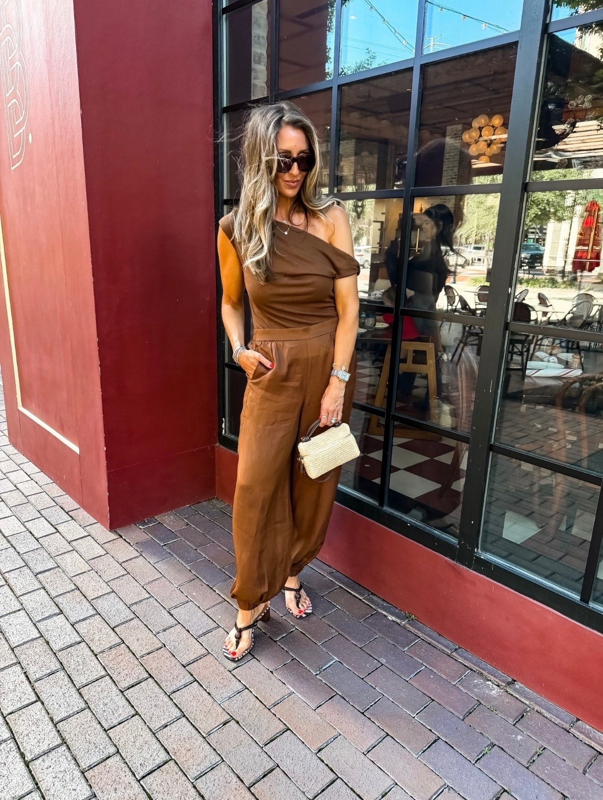 TRENDING! This chocolate brown outfit feels so elevated and expensive looking. The one shoulder top paired with the linen pants is effortlessly chic, and I love how the woven bag softens the look for summer. It’s the perfect outfit for dinner, date night, vacation, or any time you want to look put together with minimal effort.

brown monochromatic outfit, one shoulder top, linen pants, summer date night outfit, vacation style, elevated casual look, woven handbag, resort wear, neutral outfit ideas, chic summer fashion, effortless style, dinner outfit inspiration, rich girl aesthetic, themominstyle

#LTKootd #LTKOver40 #LTKmomlife