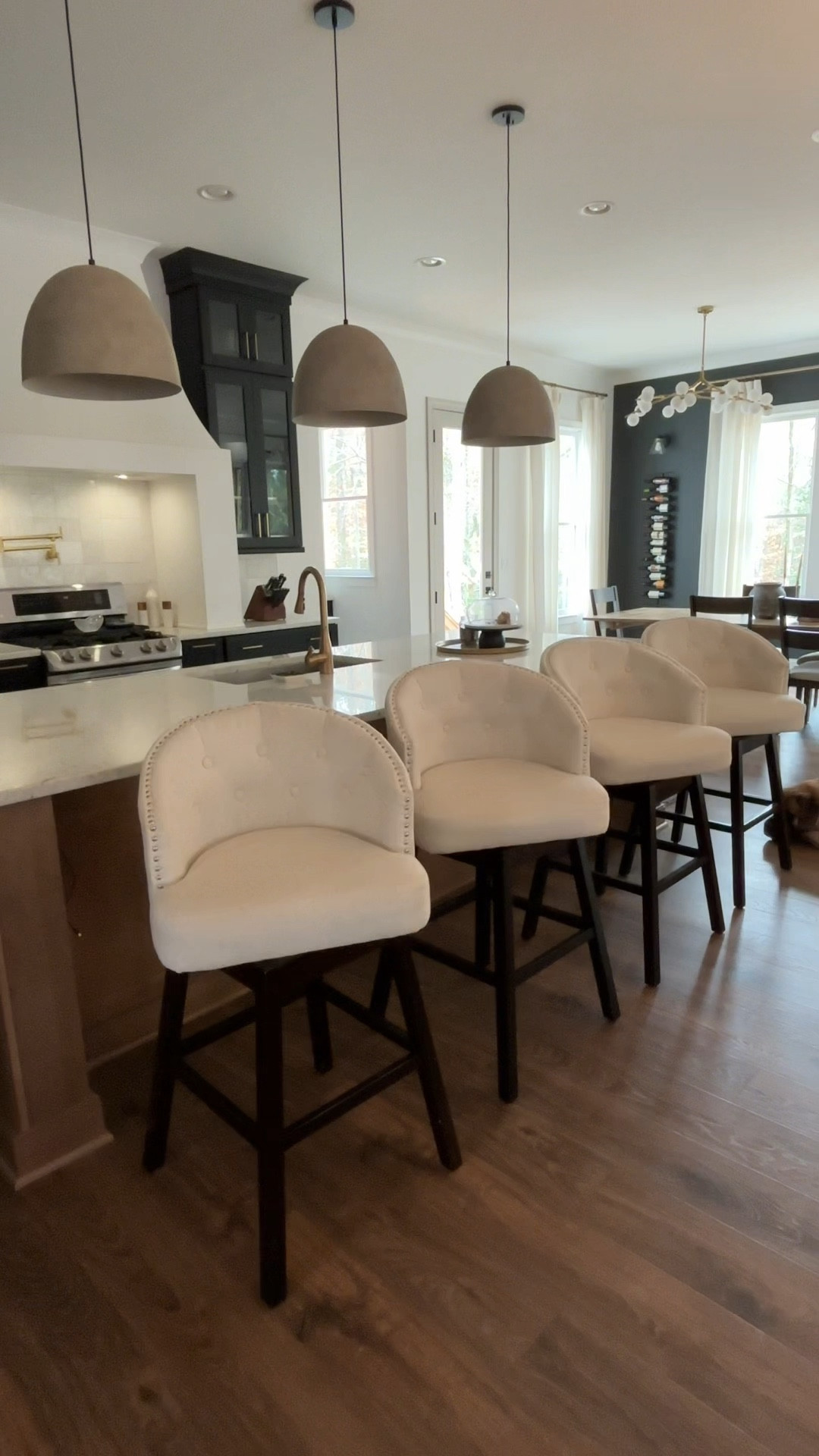 These swivel barstools are so comfy!! Our guests love sitting here when they come to visit. #barstools #swivelbarstool #barstool #kitchendecor 

#LTKStyleTip #LTKOver40 #LTKHome