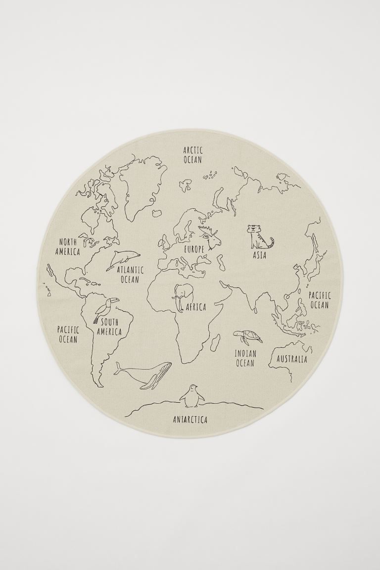 Round rug in thick cotton canvas with a printed motif depicting parts of the world, oceans, and v... | H&M (US + CA)