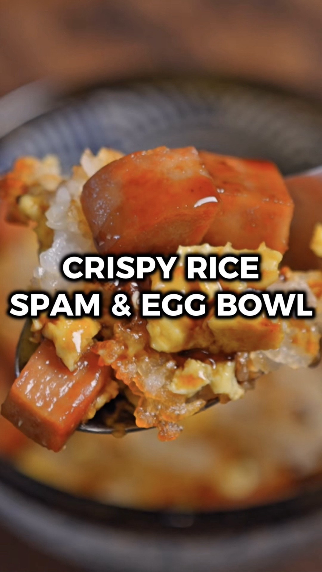 This bowl has pretty much all my favorite things in it. And admittedly, it's nothing revolutionary haha. At the end of the day it's basically just Spam and eggs with rice. But the thing that changes the game is the crispy sushi rice! 🔥

It adds that crispy texture, and you get all that flavor from the caramelization of the rice vinegar and sugar along with the savory Spam and eggs. Bachan's Japanese BBQ sauce ties it all together. It's literally nostalgia in a bowl.

Would you try it? Let me know in the comments what you think if you do! 🙌

INGREDIENTS
2 thick slices Spam (cubed)
2 eggs (scrambled)
2 instant rice cups (~2 cups cooked)
Bachan's Japanese BBQ Sauce (to taste)
1 scallion (optional; garnish)
1 tbsp furikake (optional; garnish)

INSTRUCTIONS
1️⃣ Preheat the oven to 400°F. Prepare the rice and spread it in a thin layer across a baking pan. Don't use parchment paper. Bake for 35-40 minutes, flipping the rice halfway through.
2️⃣ While the rice bakes, cut two thick slices of Spam into cubes. Pan fry them over medium heat until they darken and get a little crispy on the outside. Set aside.
3️⃣ Beat the eggs in a small bowl, then pour into a pan over medium low heat and scramble them. Transfer to a plate and chop into bite sized pieces. Set aside.
4️⃣ When the rice is done, break it into small pieces and add to a bowl along with the Spam and scrambled eggs. Mix everything together and top with Bachan's, chopped scallions, and furikake.
5️⃣ Enjoy!

#LTKfoodie #LTKHome