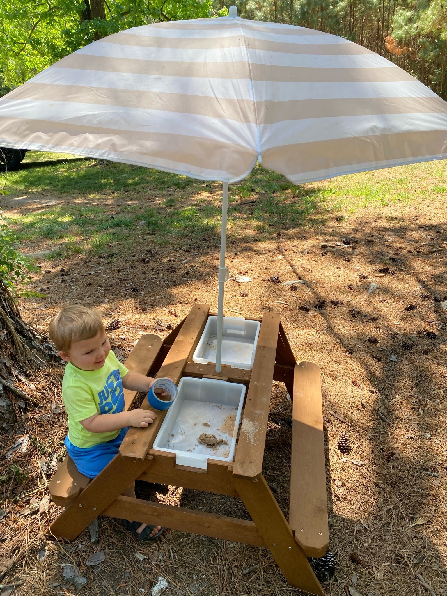 Kids picnic table with removable table top with sensory bins underneath! Adjustable umbrella as well! Great summer fun idea for the kiddos!

#LTKmomlife #LTKKids #LTKOver40