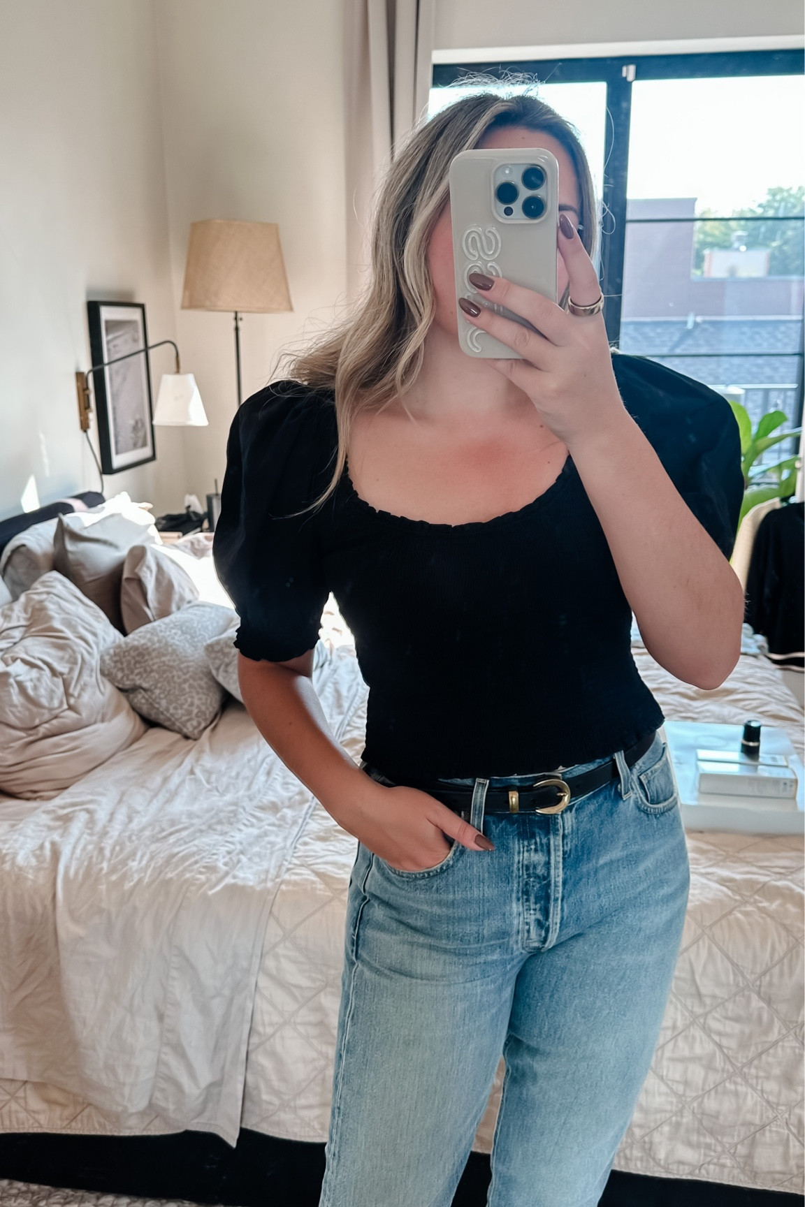 Puff sleeve top with a smocked bodice. Runs kind of small for having stretch! I’m in a Medium and it’s snug. Currently on sale, also available in white! 

#LTKsalealert #LTKfindsunder50 #LTKworkwear