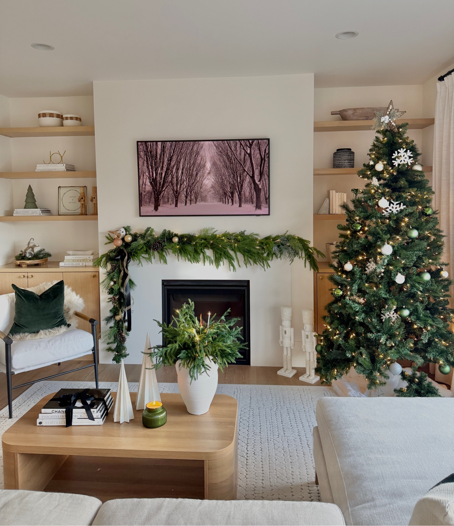 My Christmas Family Room! 🤍🌲 December 1st means the Christmas decor is officially acceptable - even though my house has been decorated for a WHILE! 😂 I just love how my family room looks this year. I went with a green & white color scheme and it is so festive and elegant! christmas decor, christmas family room, holiday decor inspo, holiday decor, elevated holiday house, holiday living room decor, neutral christmas, white and green christmas #christmasdecoration #holidaydecor #christmashomedecor #homedecorinspo #holidayhome #greenandwhitechristmas #modernchristmas

#LTKSeasonal #LTKHome #LTKHoliday