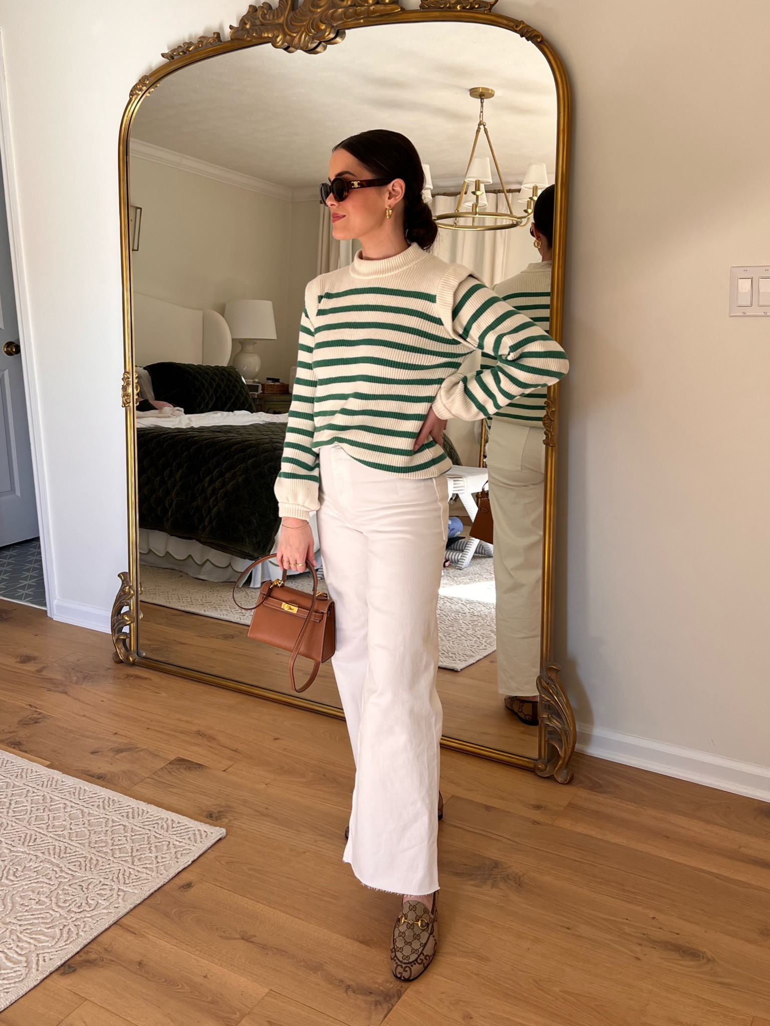 Zara marine straight jeans + Amazon striped sweater (size small) + Celine triomphe sunglasses + Gucci loafers + Hermes mini Kelly lookalike 

#LTKSeasonal