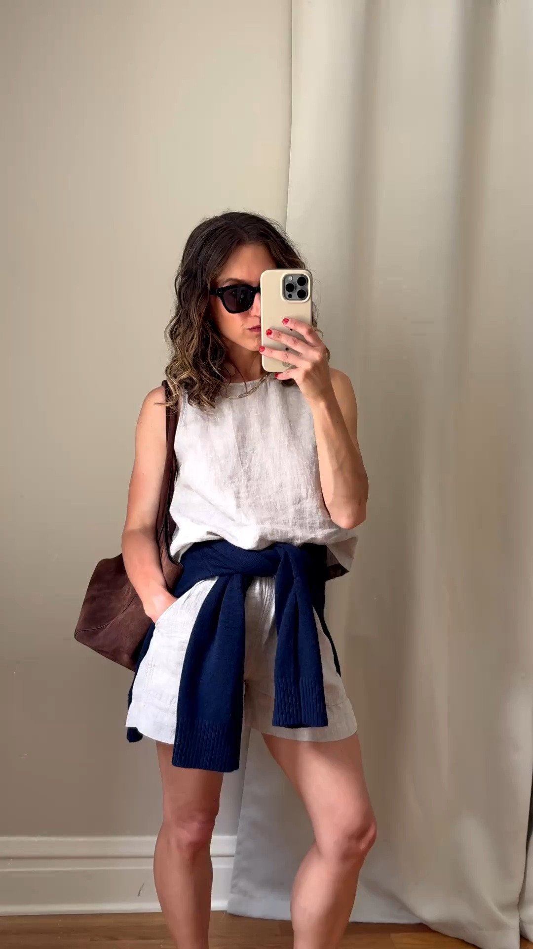 What to wear when it’s hot @Quince 

An easy linen set with a relaxed top and elastic waist shorts. Elegant but breathable!

A navy sweater tied at the waist and suede bag add some texture to a warm weather look.

Everything fits true to size.

#quincepartner