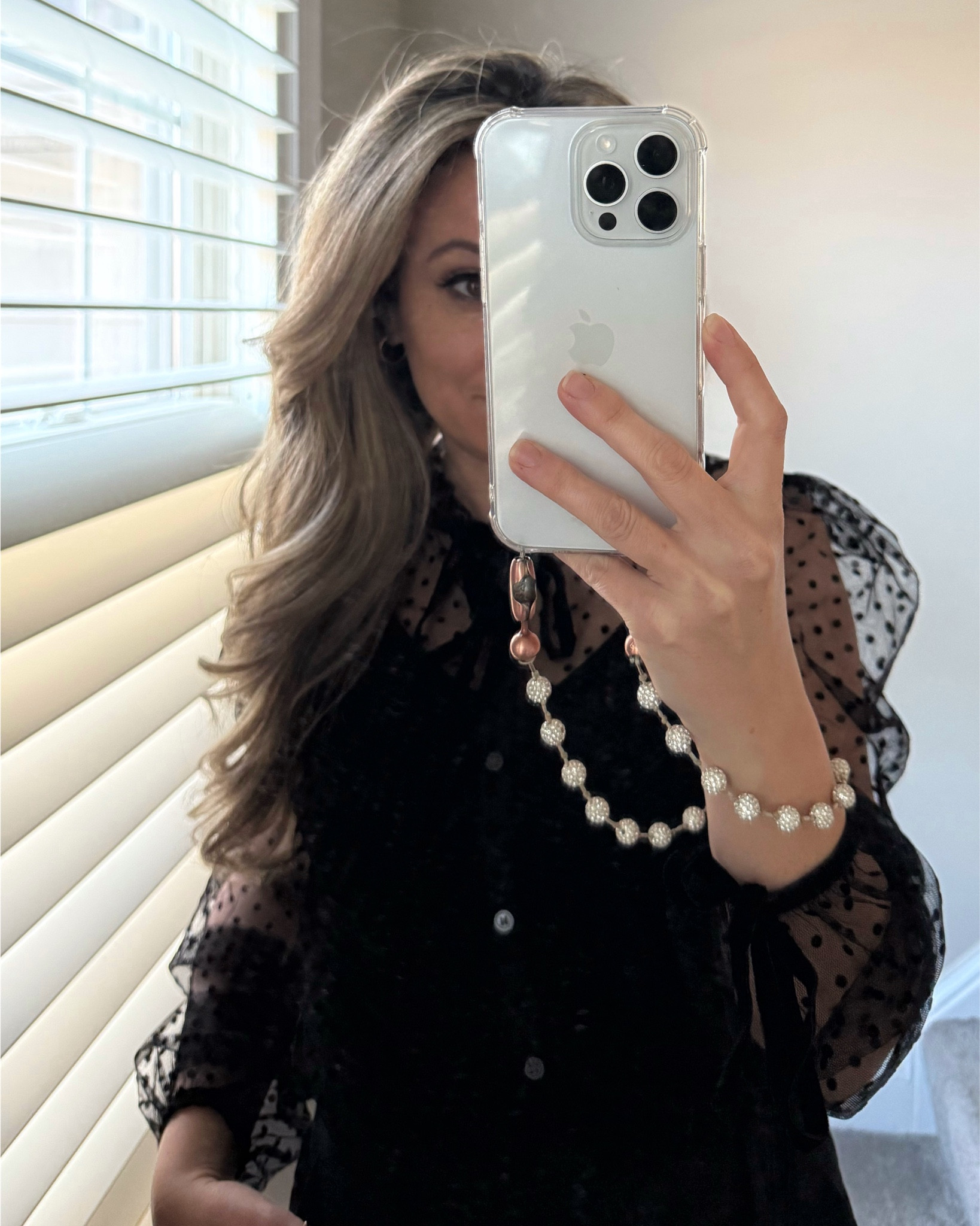 Black dotted sheer blouse, perfect for the holidays pair it with red pants, black skirt, black faux leather pants. Or for a more casual look it’s perfect with jeans.  Currently 50% off

#LTKSaleAlert #LTKHoliday #LTKootd