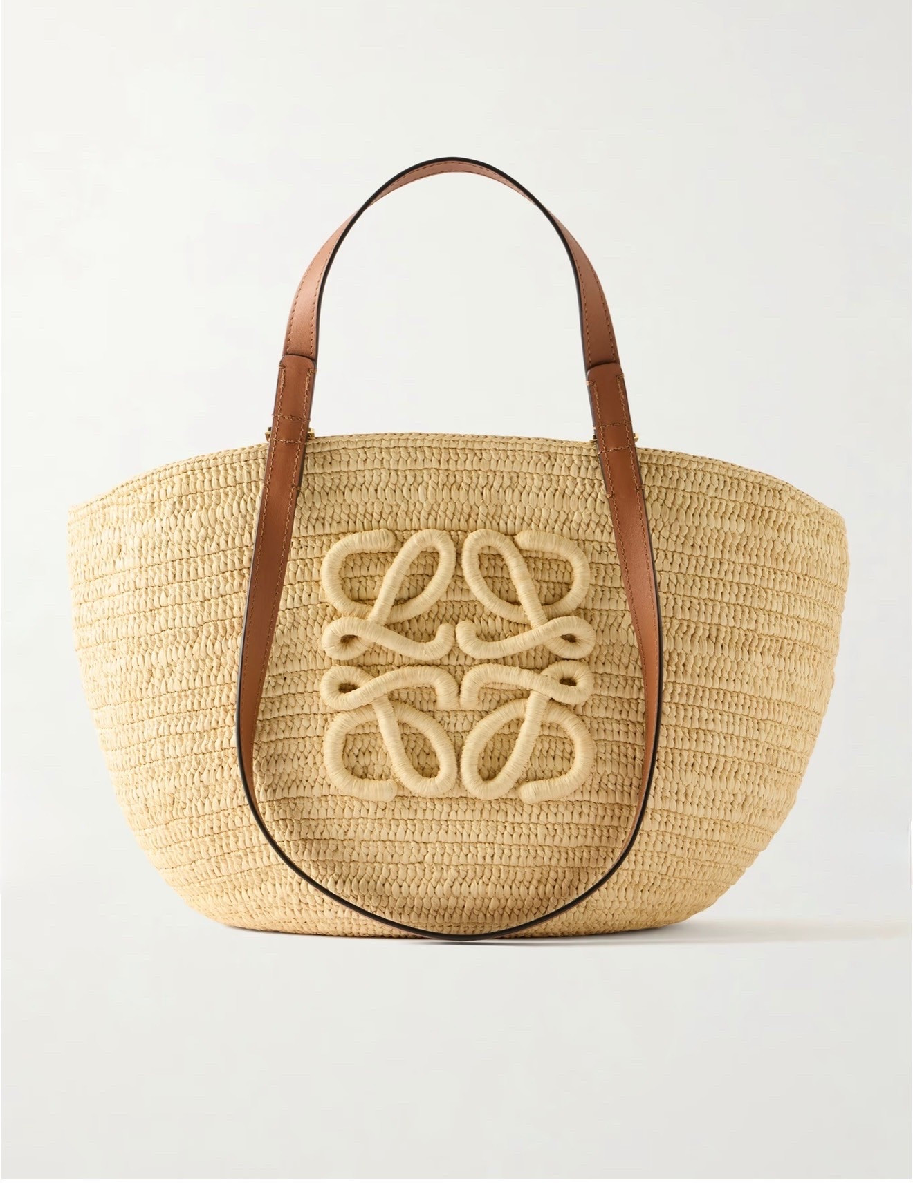 LOEWE
+ Paula's Ibiza Eclipse Basket medium leather-trimmed raffia tote

Reprising its collaboration with Paula’s Ibiza, Loewe’s 'Eclipse Basket' tote is woven from raffia in a curved silhouette.

#LTKSeasonal #LTKTravel #LTKWorkwear