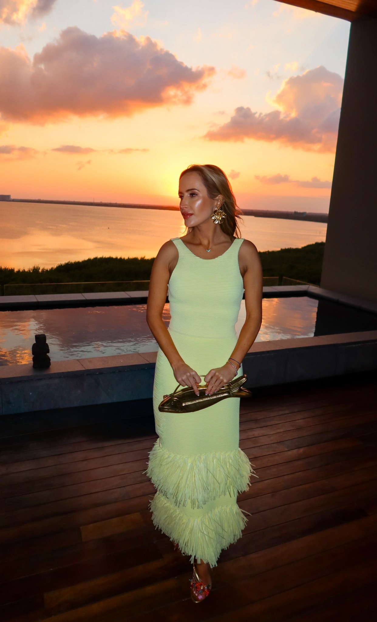 This top and skirt were perfect for a weekend in Mexico. Lightweight, and so much fun to wear! The movement of the fringe was magical. Perfect for spring break or a party look this spring! 

#fish #fishbag #mexico #travelstyle #yellow #vacationlook #getaway #soring #springbreak 

#LTKPetite #LTKOver40 #LTKTravel