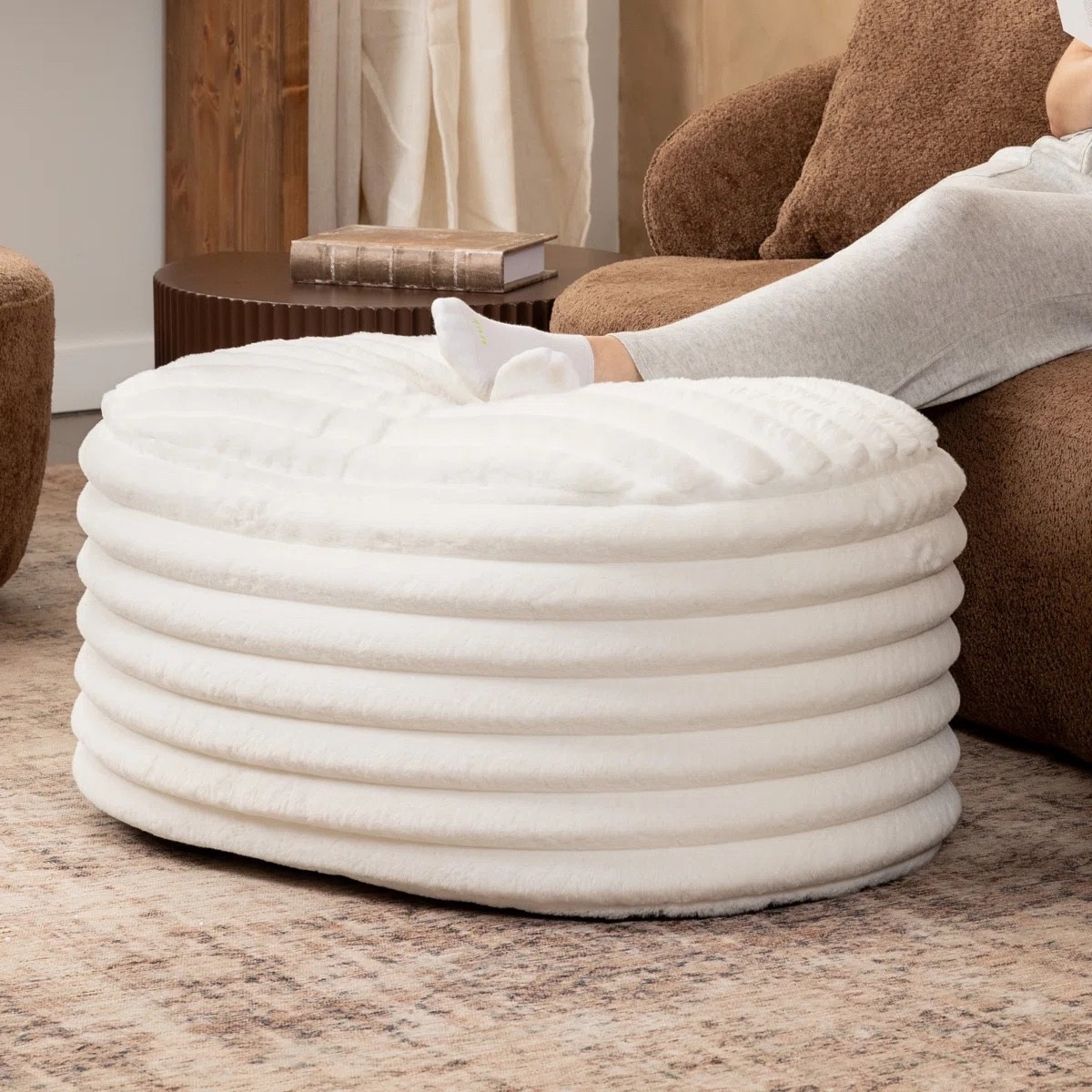 The coziest footrest / extra seat moment 🤍
This plush, oversized round ottoman is perfect for kicking your feet up, pulling up as extra seating, or layering into a cozy living room setup. The soft, cushioned texture makes it feel like a cloud underfoot.

✨ Wayfair End-of-Year Clearance: this style is currently marked down for a limited time, making it the perfect moment to snag a cozy accent for less.
I’ve tagged the exact ottoman shown, plus I’m also linking similar styles at different price points so you can find the best option for your space and budget.

#LTKSaleAlert #LTKHome