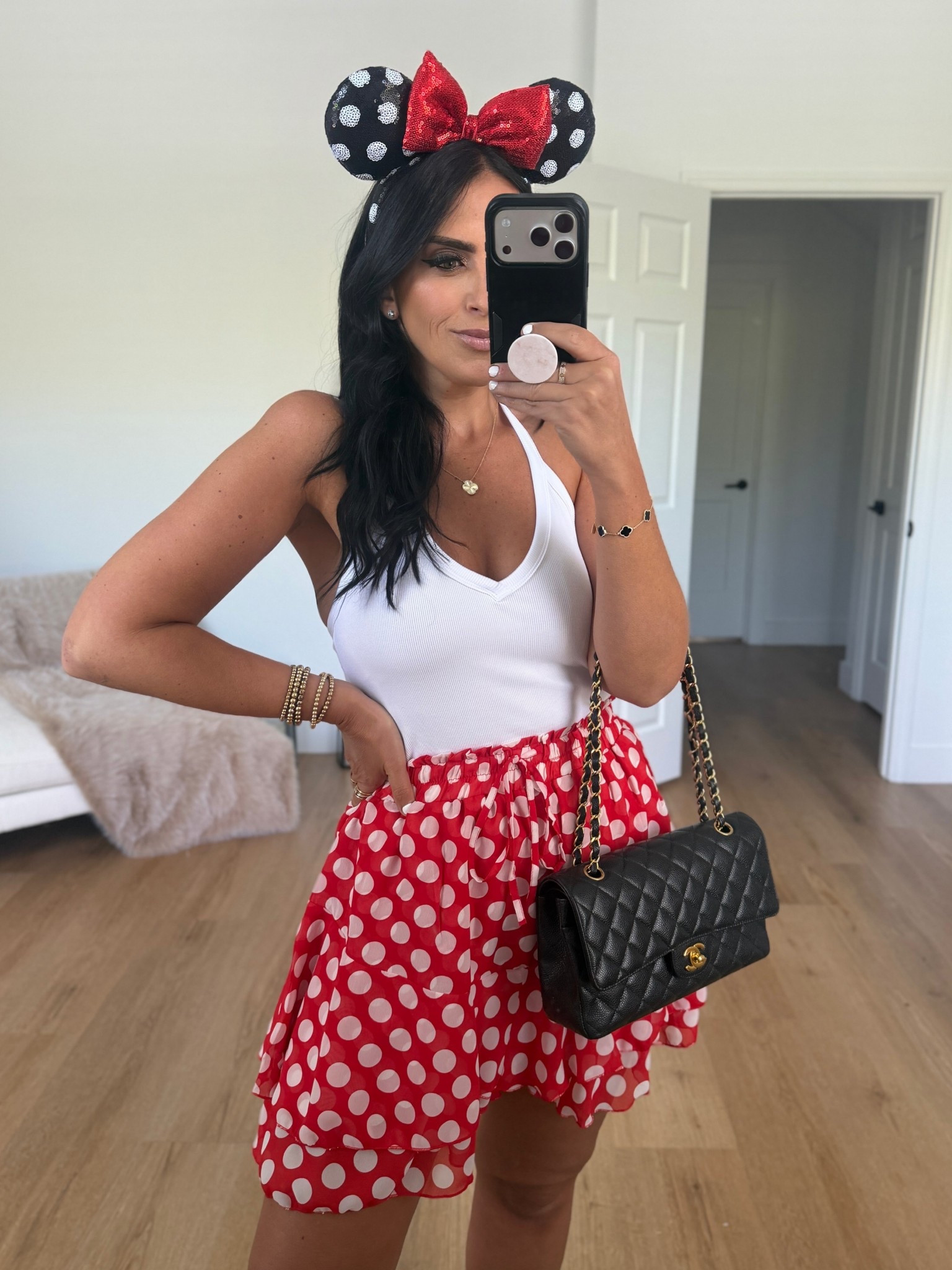 V neck tank with built in bra wearing size medium from Amazon

Red polka dot mini skirt skort wearing size medium. A good Disney park outfit 