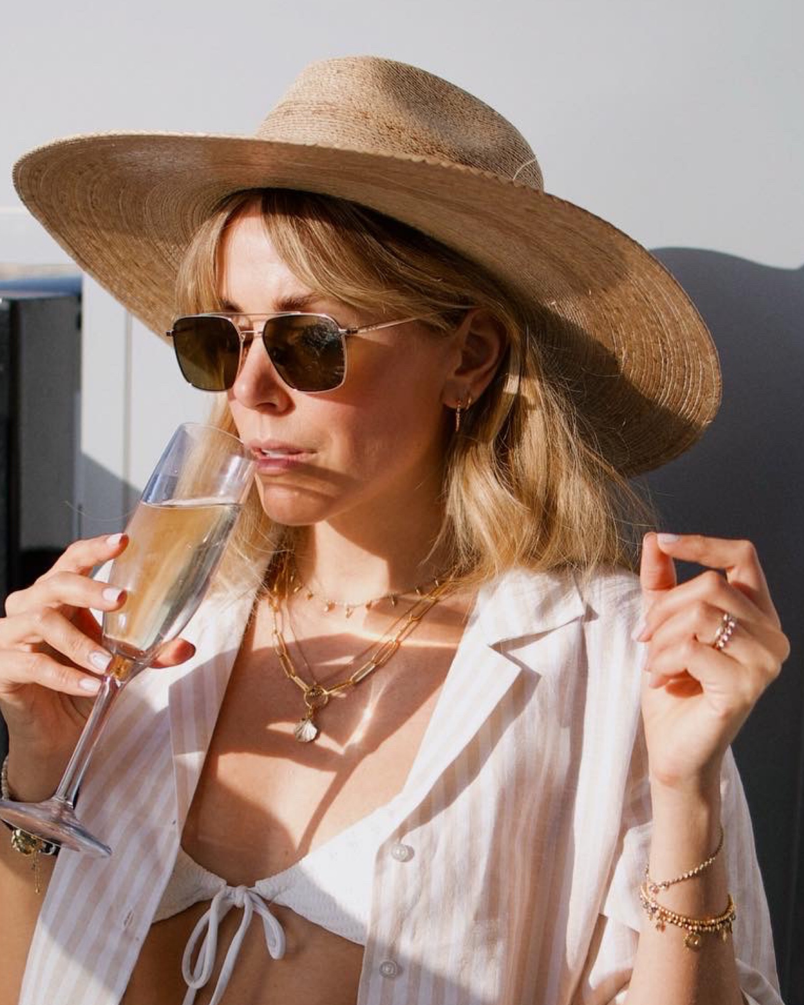 Summer accessories 
Shell necklace 
Sun hat
Sunglasses 

#LTKstyletip #LTKSeasonal #LTKeurope