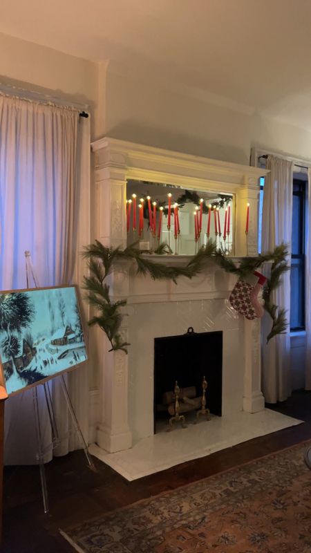 Living room Christmas decor, sleeveless, taper candles, Garland, glass, coffee table, white sectional couch

#LTKHoliday #LTKhome #LTKstyletip