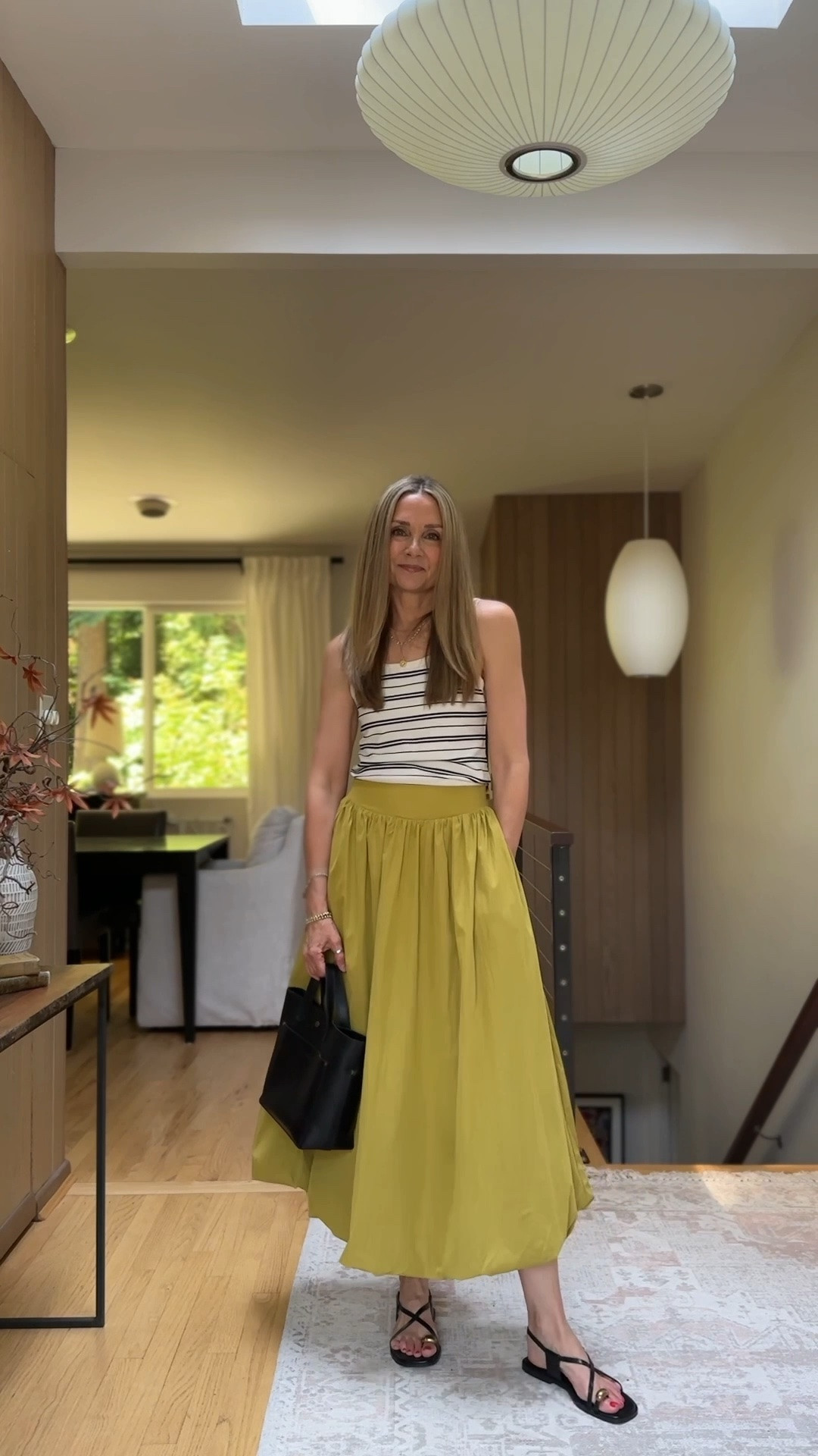 Viral Amazon bubble hem skirt that totally lives up to the hype! Styled with my @Spanx  striped tank and black accessories! Love this summer look. 

I’m 5’6” and wear small in top and skirt.

#LTKOver40 #LTKTravel #LTKootd

#LTKgrwm #LTKWorkwear