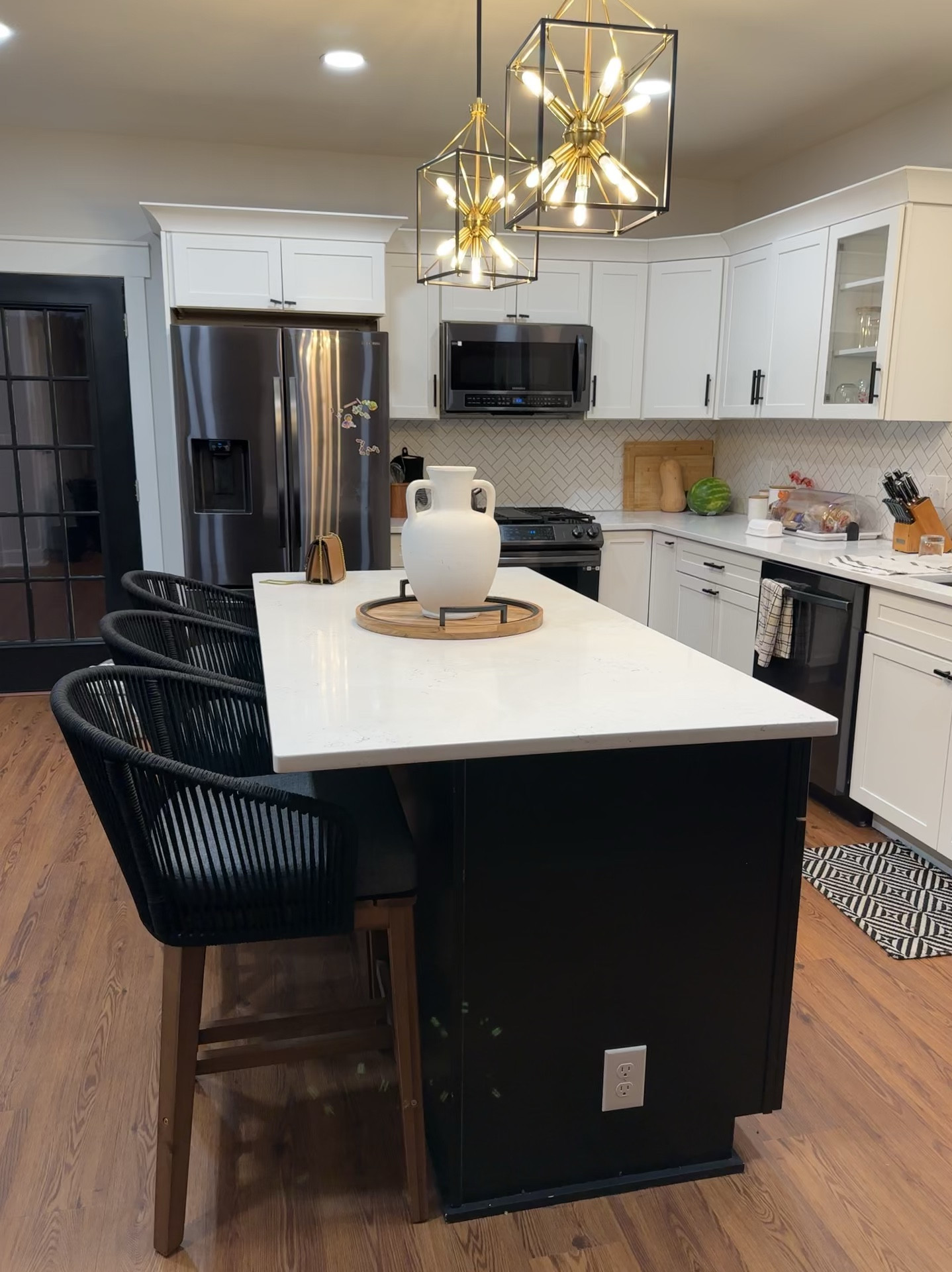 These Woven outdoor stools with removable cushion and wooden seats made for the perfect barstools for our kitchen counter. 

#LTKHome #LTKSeasonal #LTKStyleTip
