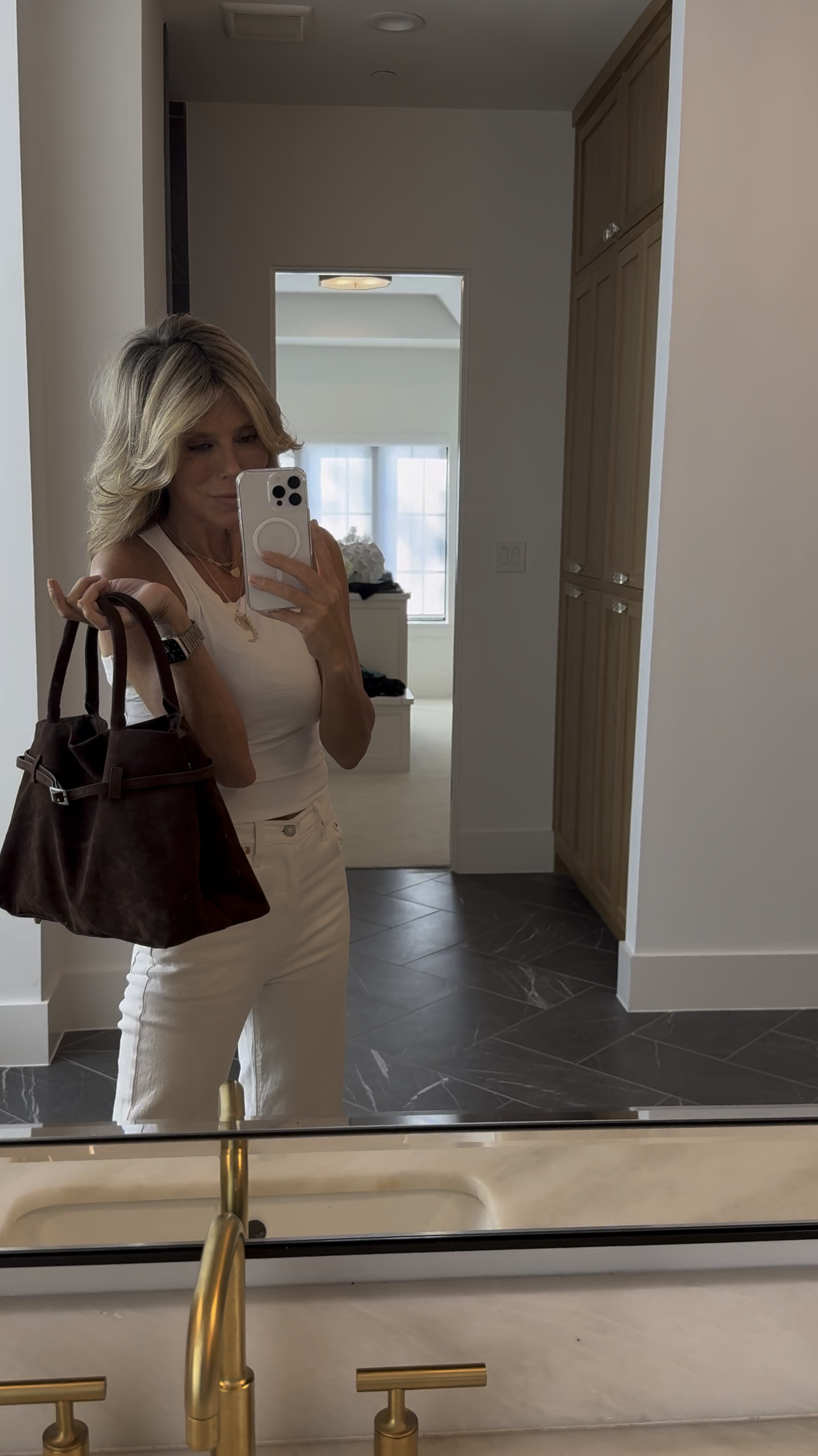 Cream jeans + mules + white tank + new look-for-less bag ✨ And ofc Melinda Maria jewelry 🫶🏼

Jeans: wearing 26
Tank: medium; doesn’t lose shape; perch length to pair with jeans; comes in 2 lengths - I’m wearing short length 
Bag: cutest look-for-less
Jewelry: Melinda Maria - use promo code StephanieF to save sitewide
Shoes: old Zara but I found some super cute ones just like them

Also linked my RMS bronzer that’s on my counter…so good!! New favorite for sure! 



#LTKFindsUnder50 #LTKSeasonal #LTKItBag