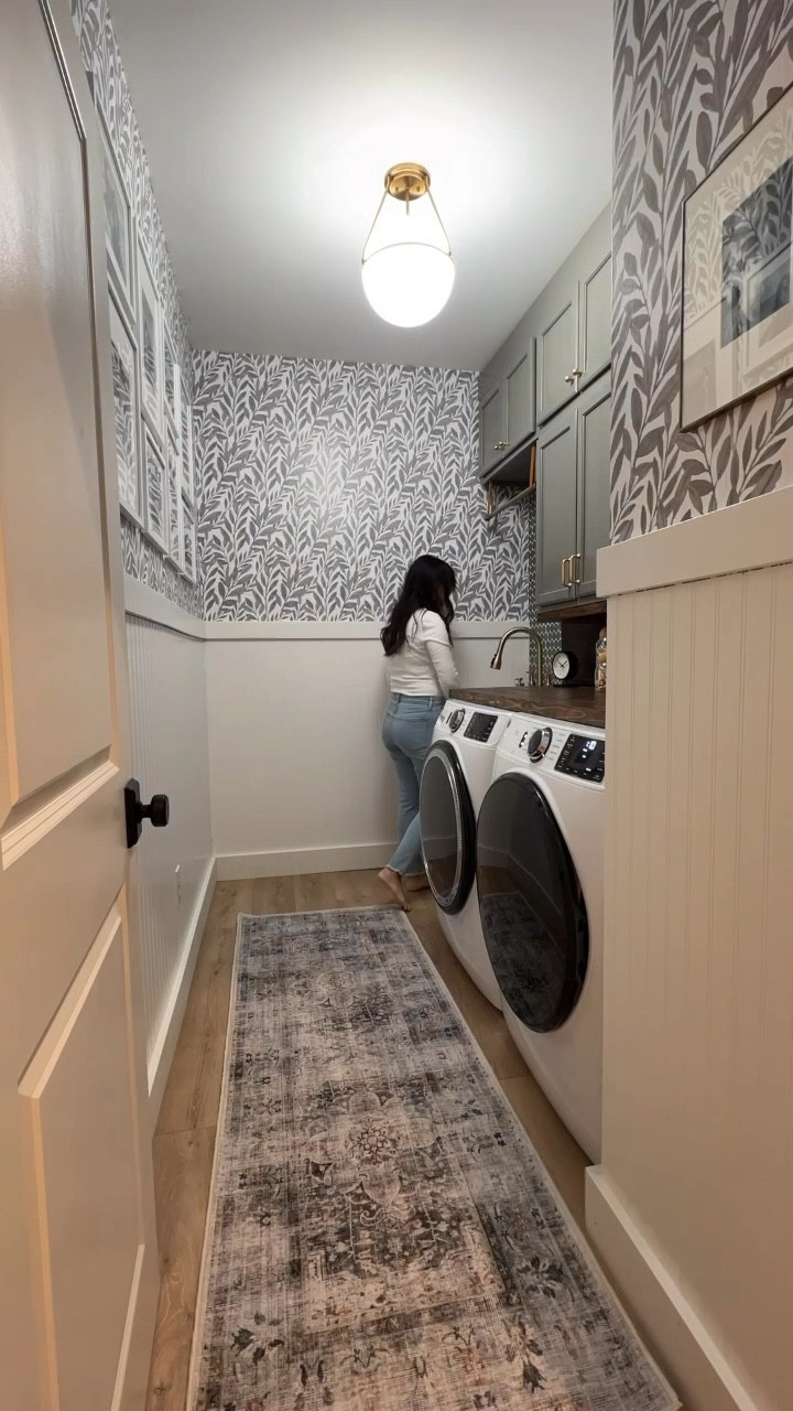 Laundry Room Renovation / DIY laundry room Reno / Ruggable runner / peel and stick wallpaper / beadboard / brass flush mount light / brass faucet / laundry room sink / farmhouse sink / green cabinets diy / washer and dryer set / functional laundry room / one room challenge 

#LTKSaleAlert #LTKHome