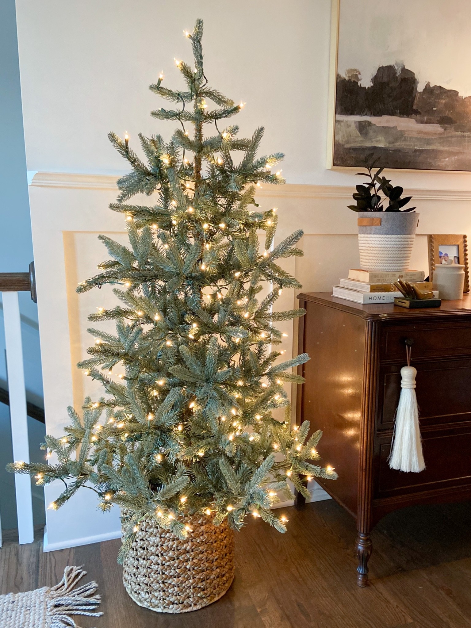 One of my favorite trees from last year is back in stock! This is the 5 foot version and my exact basket is linked. I didn’t use any decor on it last year, but thinking of some simple velvet bows this year…she is beautiful all by herself, though !

#LTKHoliday #LTKhome #LTKSeasonal