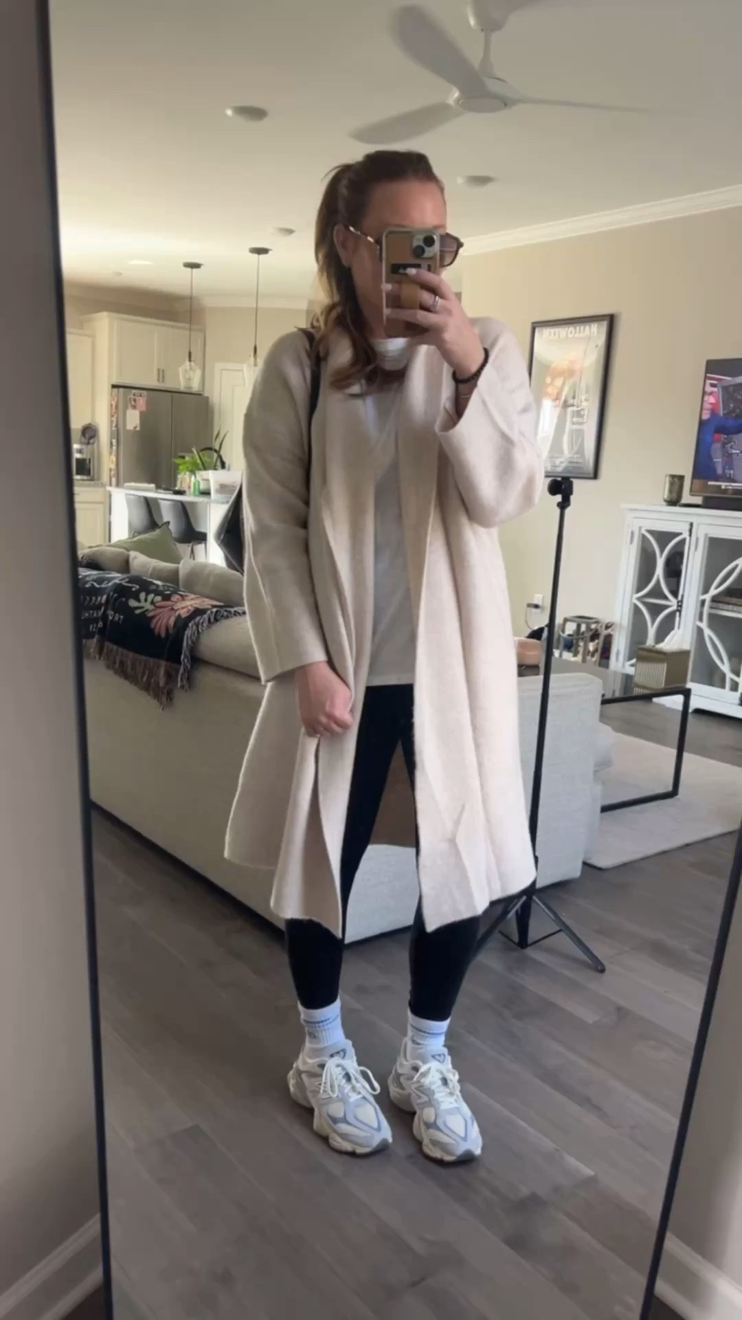 Oversized white tshirt - tts wearing a medium 
Long sweater Coatigan - tts wearing a medium 
Black leggings tts wearing an 8
Black shoulder purse 
Chunky New Balance Sneakers / tts
Crew socks 
Sunglasses 

#LTKdayinmylife #LTKActive #LTKootd