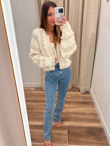 Absolutely in love with this cream pom pom cardigan!!—Delray Beach locals can find this adorable piece at Coco & Co on Atlantic Ave! 

For sizing, I am 5’3 115lbs wearing XS cardigan and size 24 Simkhai Archer denim! 