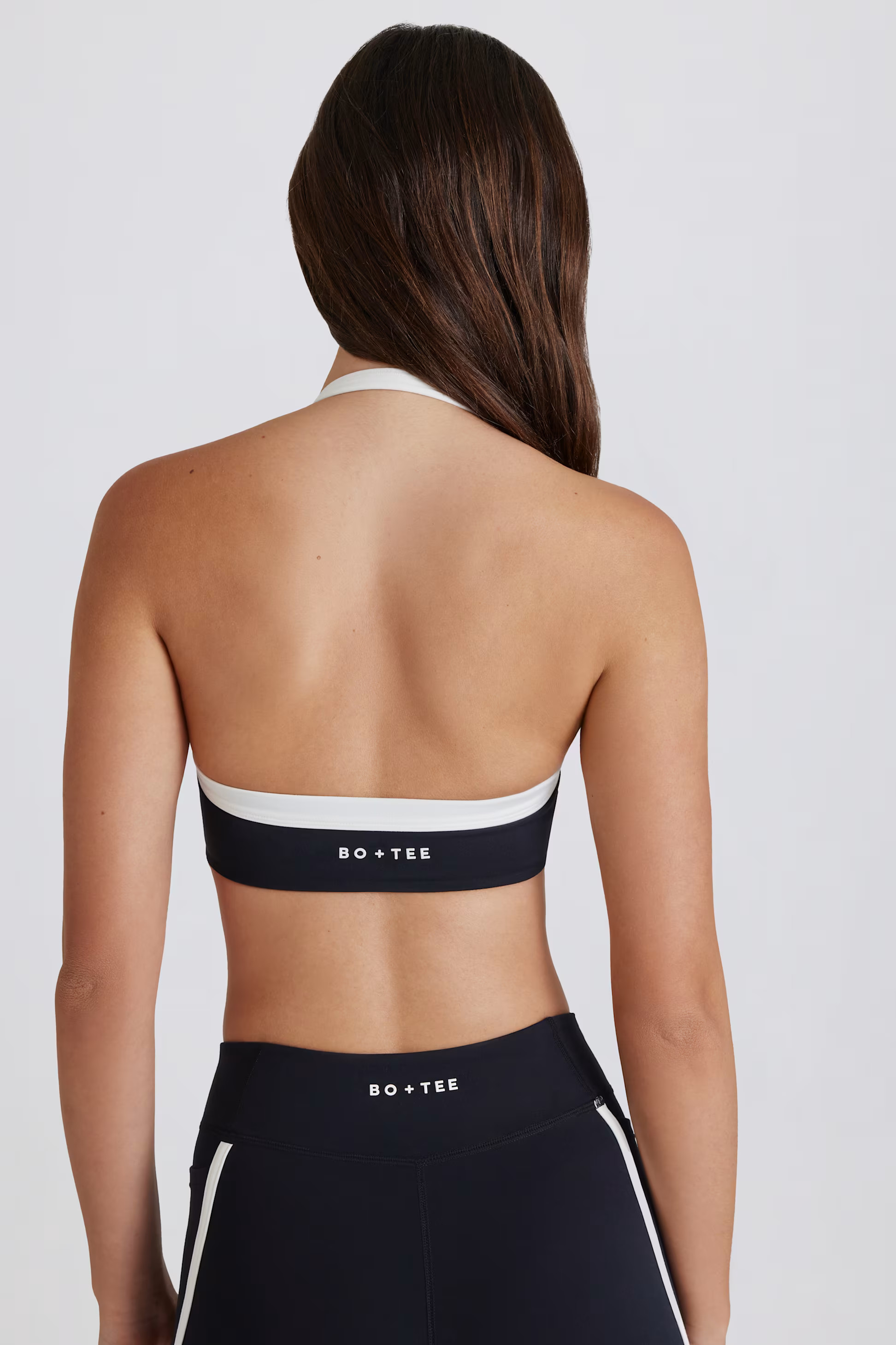 Soft Active Twist-Front Halterneck Sports Bra in Black | Bo&Tee