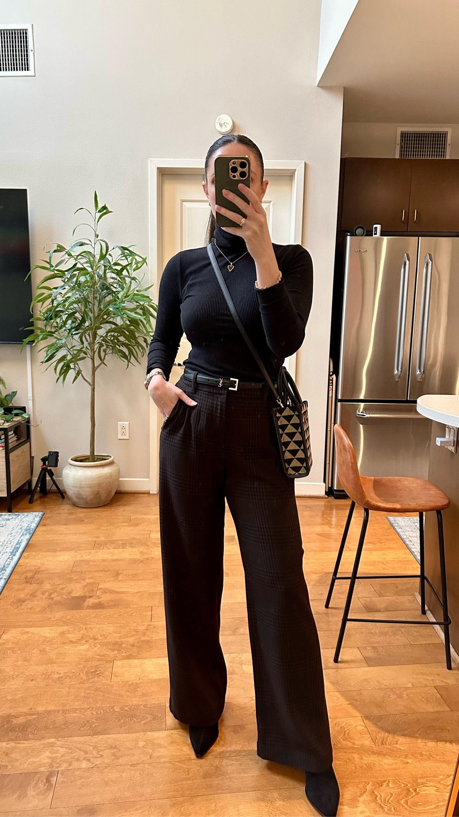 Black turtleneck S
Plaid dress pants 27R
Point toed booties 7.5
Belt
Prada crossbody 