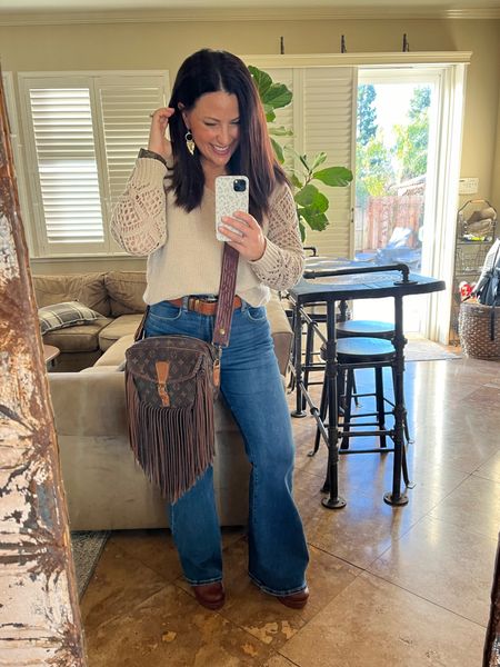 Easy look for a fun night out with friends. Petite High rise flare jeans, sweater, clogs, boho fringe LV bag. 

#LTKover40 #LTKstyletip #LTKmidsize