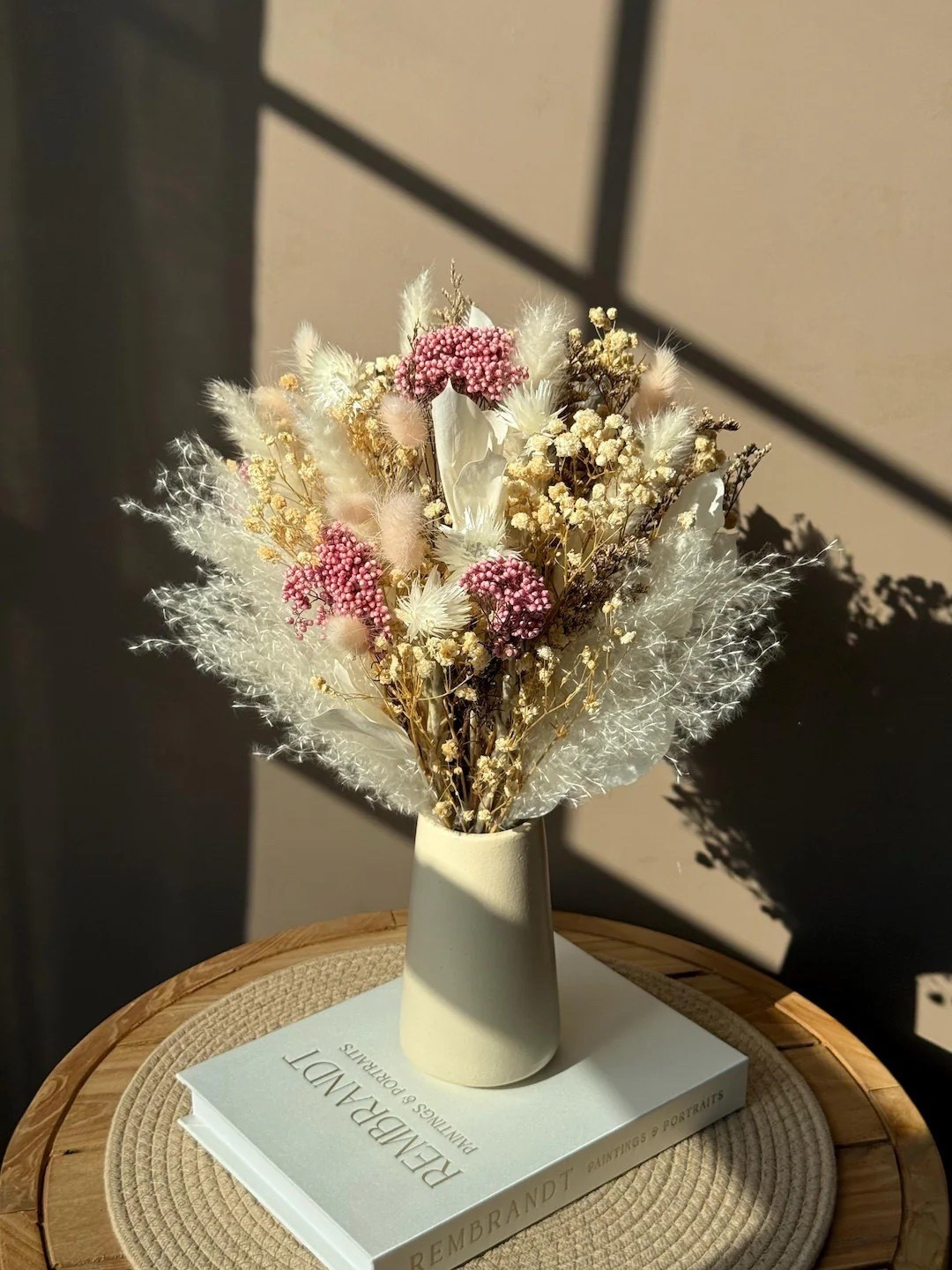 Sweet, airy, and full of soft romance, the Cotton Candy Bouquet by EverdriedBloom brings dreamy pastel charm to any space. Fluffy textures and delicate tones of blush pink, creamy white, and soft beige create a light, whimsical arrangement that feels elegant yet effortless. Made with real dried botanicals, this 16-inch bouquet offers long-lasting beauty with zero maintenance—perfect for styling on a coffee table, shelf, or bedside. Available with or without a vase and thoughtfully shipped from North Carolina, it also makes a lovely gift for birthdays, anniversaries, weddings, or Mother’s Day.

#LTKhome #driedflowerdecor #pasteldecor #bohodecor #romantichome #homedecorinspo #neutraldecor #giftideas #ltkstyle #softdecor

#LTKSeasonal #LTKWedding #LTKHome