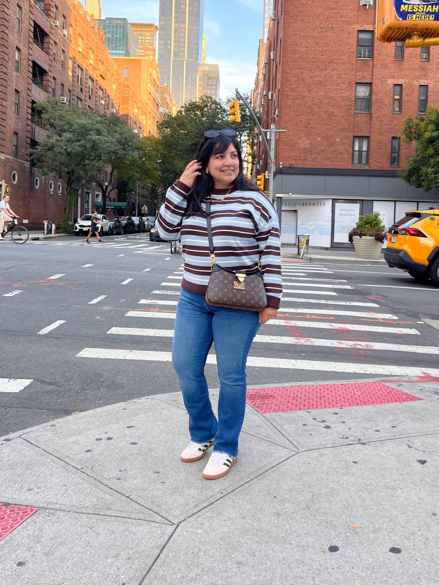 This fun striped sweater is back this season in two new color combos - navy and light blue as well as chocolate brown and pink. 

Mango oversized striped sweater size large. Mother Hustler jeans size 32. Adidas Spezial casual sneakers (run big - size down). I normally wear a 7.5 or 8 and wear these sneakers in a size 7. Prada sunglasses. 

#LTKPetite #LTKMidsize #LTKOver40