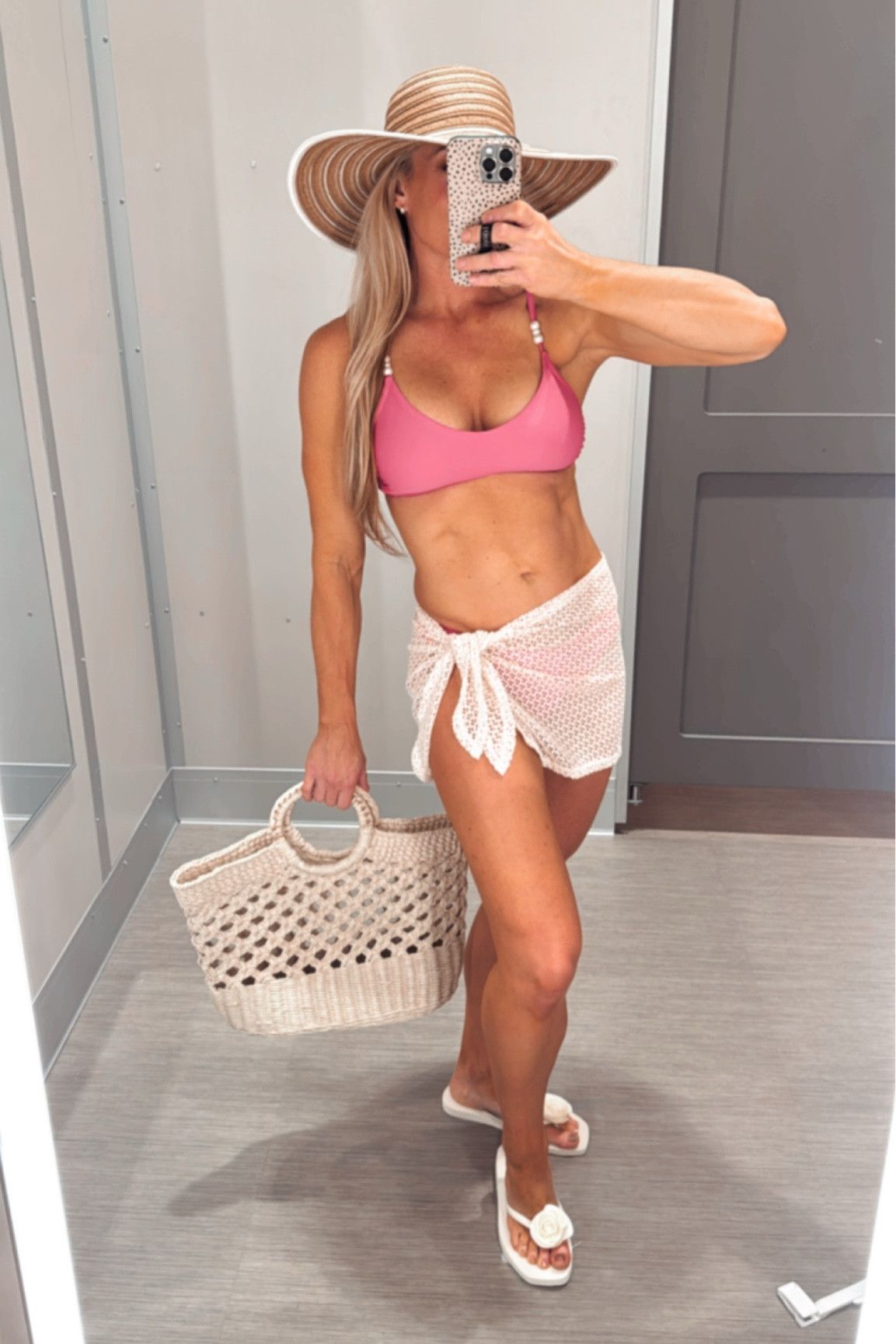 Spring and summer swim wear is here! This pink bikini with pearl bead embellishments on the top is absolutely gorgeous! Love the crochet sarong and matching weaved beach bag. The sun hat is perfection and goes with any summer suit. The rose embellishment on the flip flops adds such a sweet touch to finish off the look!

#LTKSwim #LTKSaleAlert #LTKFindsUnder50