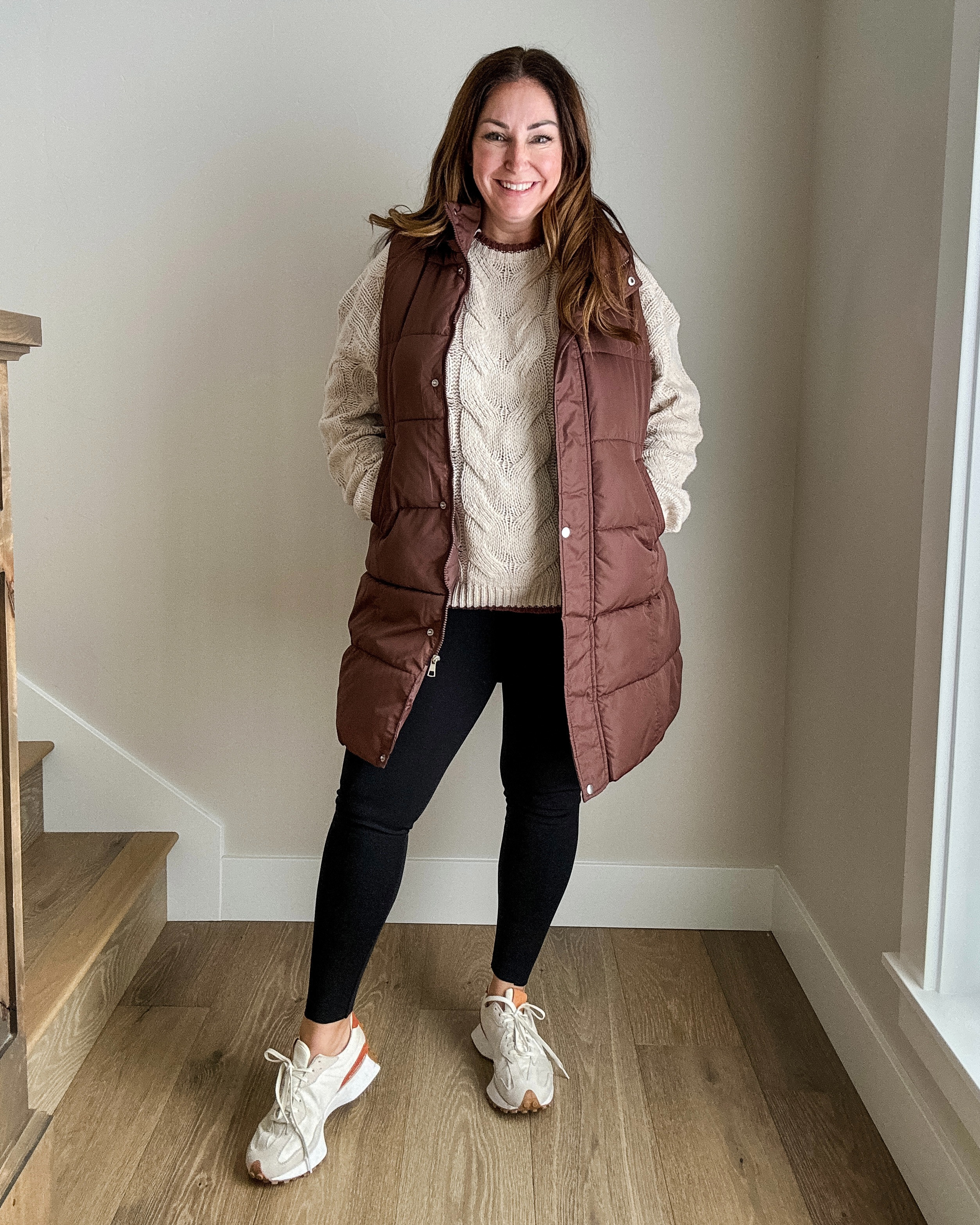 Fall outfit with long puffer vest and cable knit sweater. 
·Use code 303S7VBW for 30% off through 11/10 
·Wearing large in vest, sweater and leggings 

 #LTKSeasonal #LTKSaleAlert #LTKMidsize