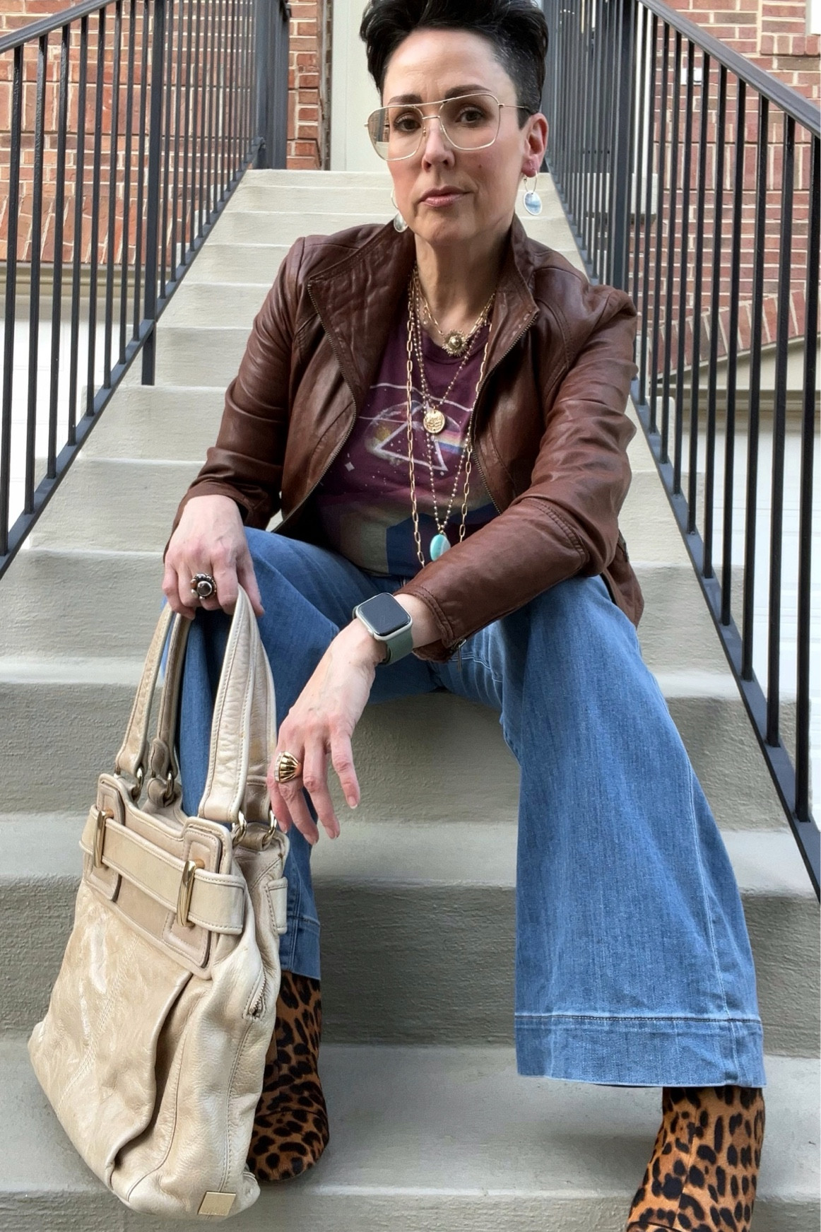 Today is a 70s inspired, boho meets rocker chick vibe with some thrifted pieces, wide leg jeans, graphic tee, layered necklaces, and my favorite glasses.

#LTKover40 #LTKmidsize #LTKxMadewell