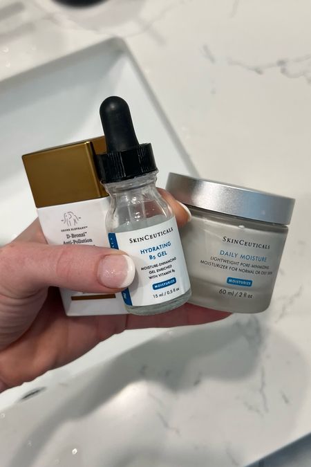 🏜✨ Living in the dry desert heat means my skin needs all the extra love it can get, and these three holy grail products have been total game-changers! 🌟

1️⃣ SkinCeuticals Daily Moisture: This lightweight yet deeply hydrating moisturizer keeps my skin perfectly balanced and never greasy. It’s a lifesaver in this dry climate! 💦

2️⃣ SkinCeuticals B5 Gel: A hydrating powerhouse! This serum gives my skin that much-needed moisture boost and helps it stay plump and radiant all day long. 🌺

3️⃣ Drunk Elephant D-Bronzi Bronzing Drops: A desert tan in a bottle! I mix a few drops with my moisturizer for a natural, sun-kissed glow without any of the sun damage. ☀️

To get the perfect bronzed and hydrated look, I blend a pea-sized amount of SkinCeuticals Daily Moisture with a few drops of B5 Gel and D-Bronzi Bronzing Drops. Mix it all together in the palm of your hand and apply evenly all over your face. Your skin will be glowing, hydrated, and perfectly bronzed! 💖




#LTKFindsUnder100 #LTKBeauty