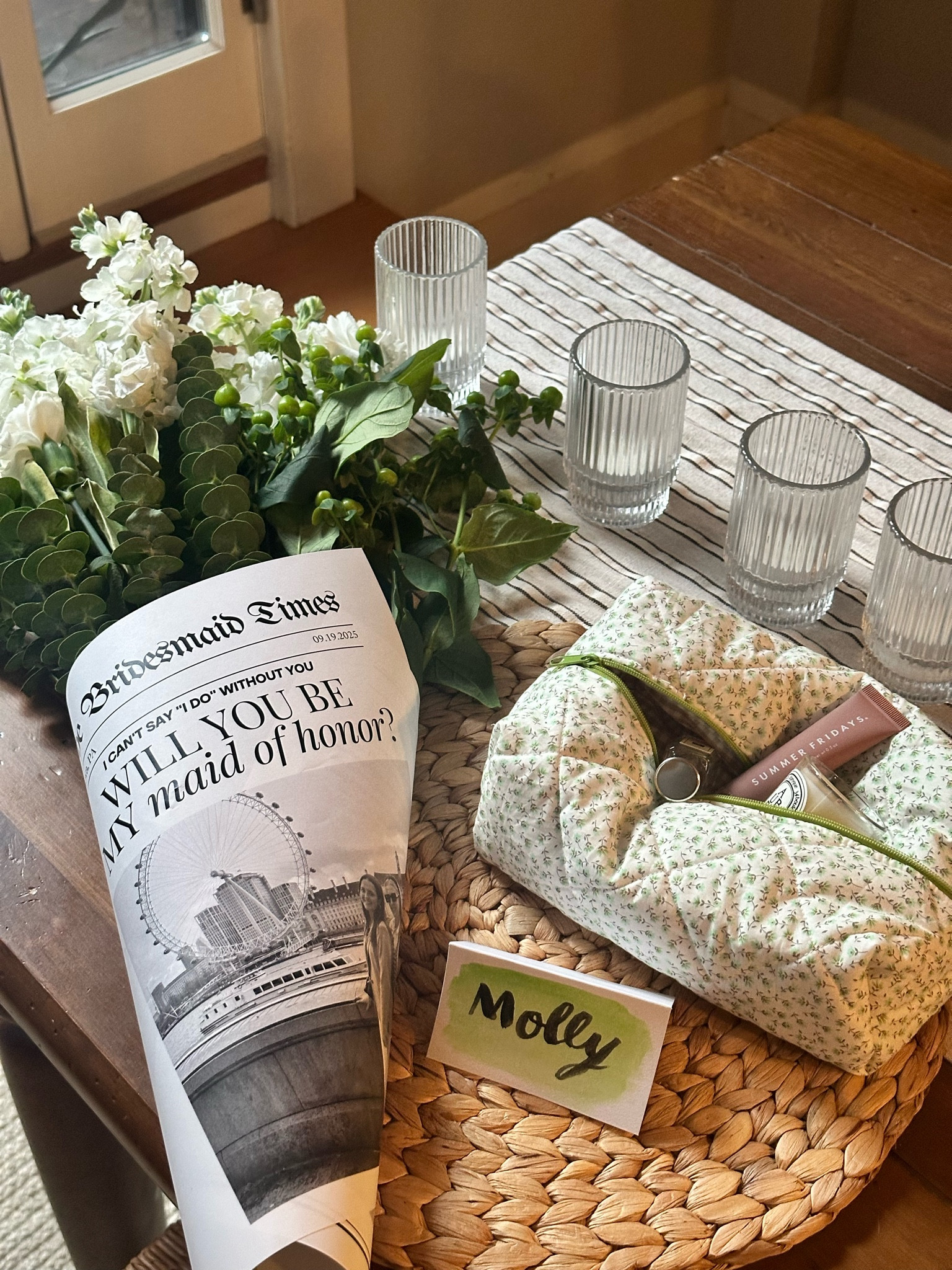 bridesmaid proposal idea with newspaper, flowers and quilted makeup bag 🎀

#LTKwedding