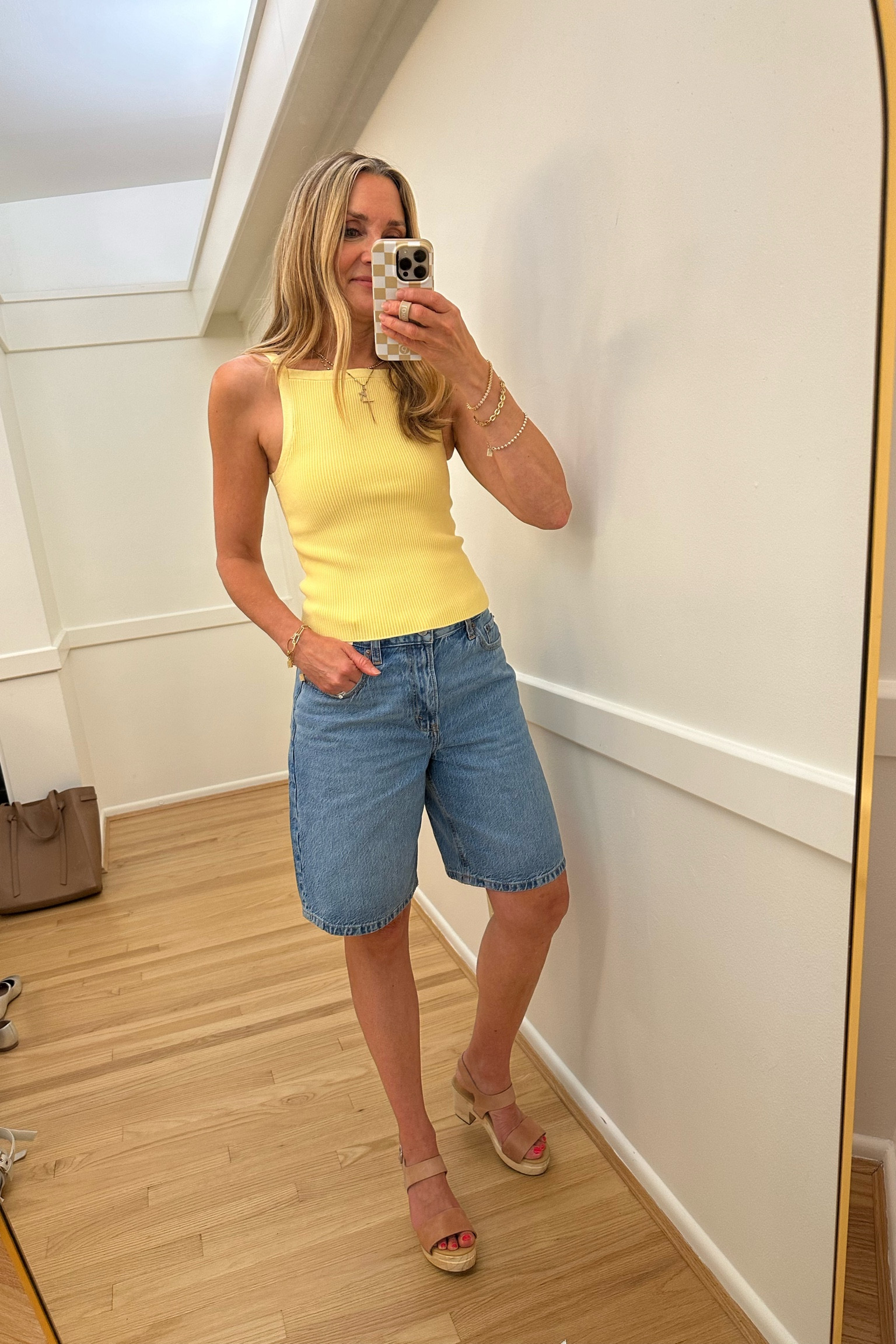 Summer outfit inspo! Abercrombie curve love high rise loose short and knit tank in butter yellow. Nisolo clog sandals on major sale! #ltkshoecrush #ltksalealert

#LTKFindsUnder50 #LTKOver40 #LTKSummerSales