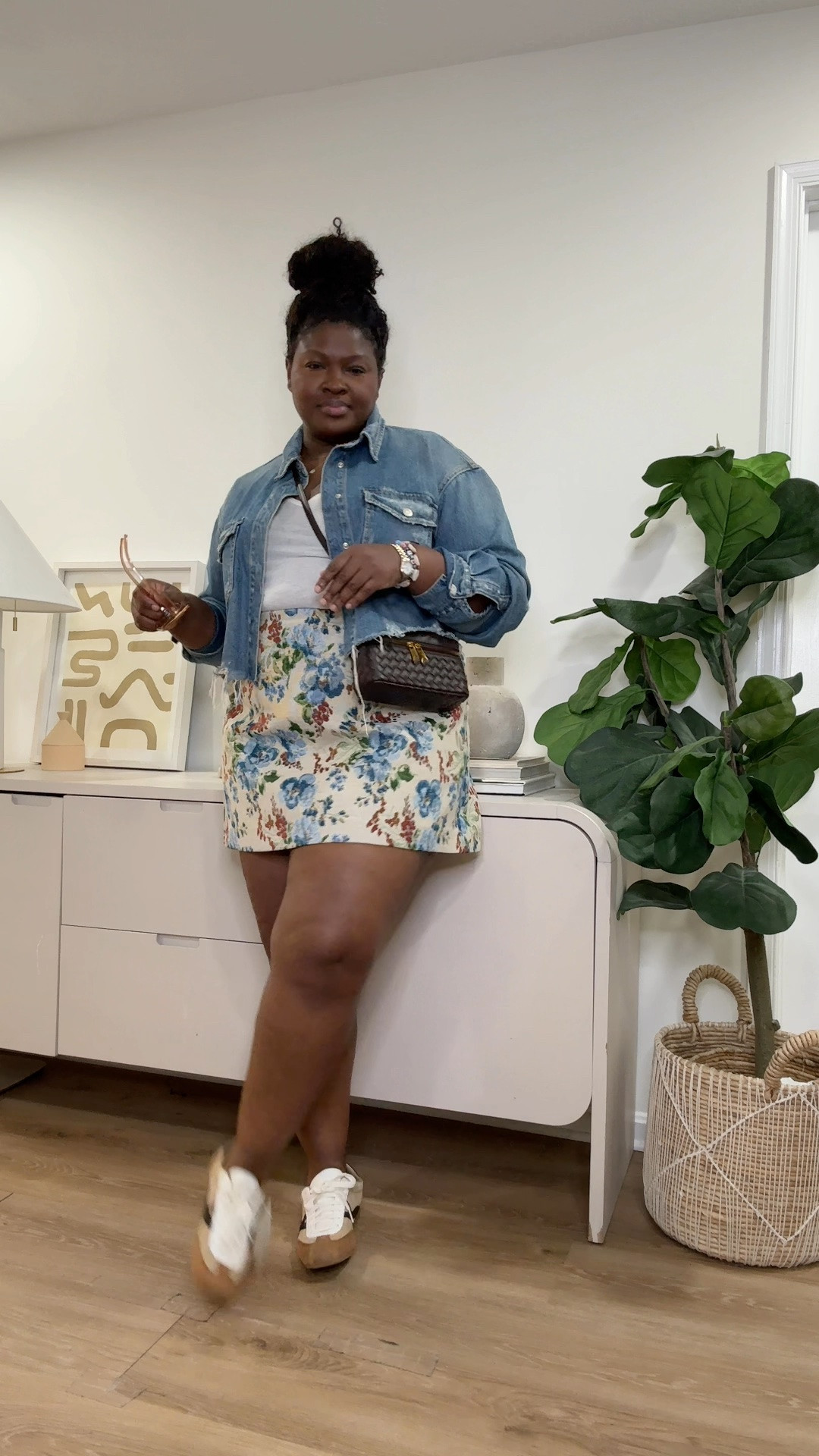 This floral mini skirt is an easy wardrobe piece that adds a feminine touch to everyday outfits. Pair it with a denim jacket, sneakers, boots, or sweaters to create different looks throughout the season. floral mini skirt, denim jacket outfit, casual fall style, everyday outfit, cute fall outfit, weekend outfit, feminine style, street style look, casual chic outfit, fall fashion, mini skirt outfit, layered outfit

#LTKootd #LTKSeasonal #LTKMidsize