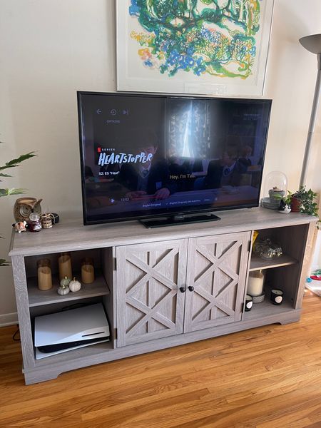 Tv stand, can hold up to a 75” tv. On sale right now! Farmhouse style. 

#LTKsalealert #LTKhome