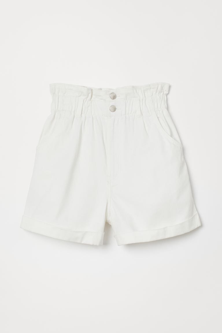 Shorts in cotton twill. High paper-bag waist with ruffle trim, elasticized waistband, and zip fly... | H&M (US + CA)