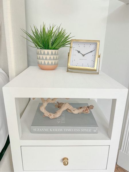 I keep my nightstand styling pretty simple in our primary bedroom! Also linked a great "look for less" option for my nightstand! 
-
Coastal Nightstands, primary bedroom decor, coastal home decor, coastal styling, beach home decor, beach house style, coastal bedroom, coastal interior, coastal decorating, white nightstand, faux plant, gold clock, 2 drawer end table, end table, upholstered bed, blue and white geometric pot, planter, table clock, bedroom styling, neutral home, nightstand styling, nightstand decor, coastal nightstands, beach house bedroom, beach house nightstands, Amazon coffee table books, driftwood branch, shelf styling. Nightstands with shelf, nightstands with drawers, Wayfair nightstands, table clock, neutral coffee table book, narrow nightstands, small nightstands



#LTKFindsUnder100 #LTKHome #LTKFindsUnder50