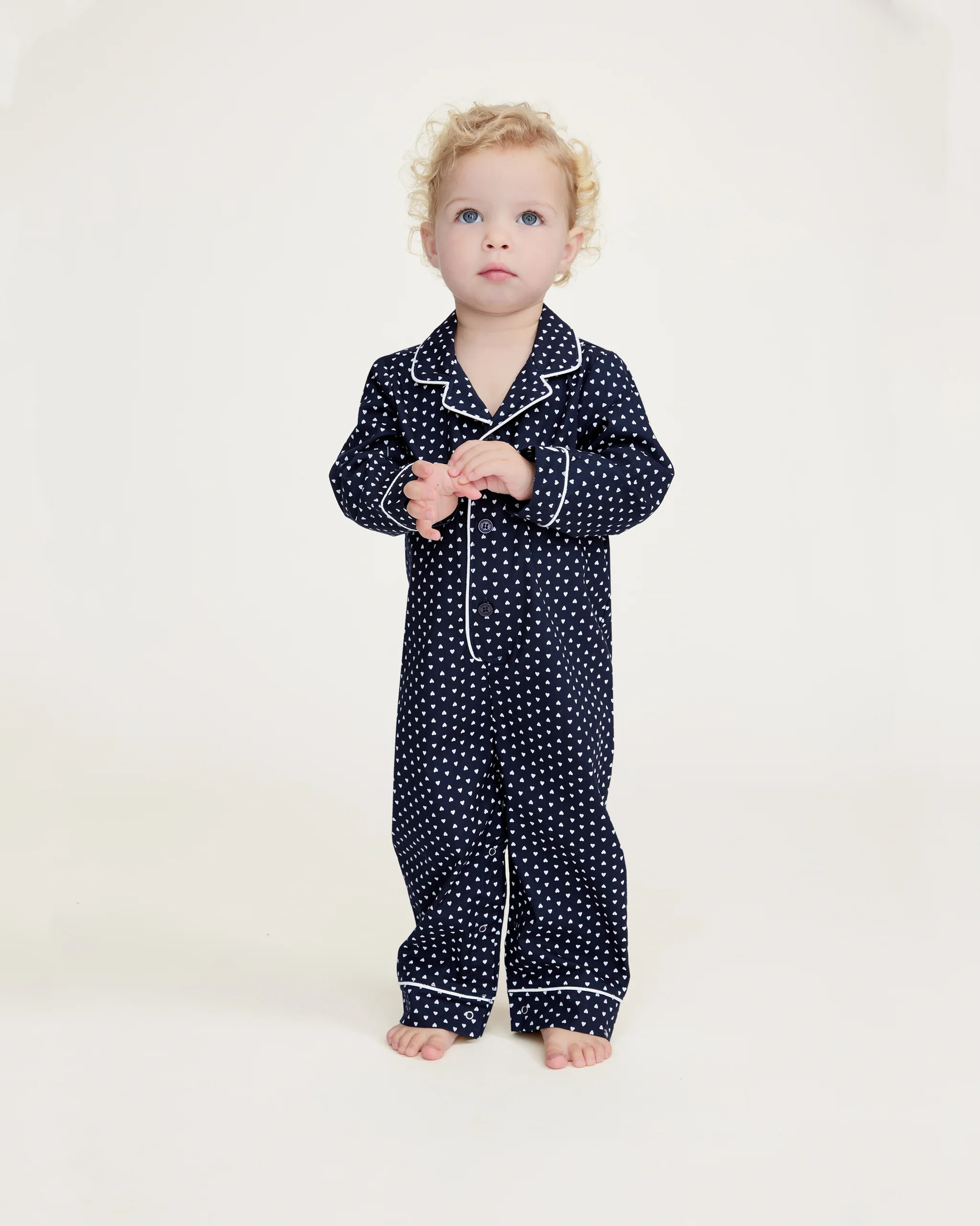 Baby's Twill Classic Romper in Midnight Hearts | Petite Plume