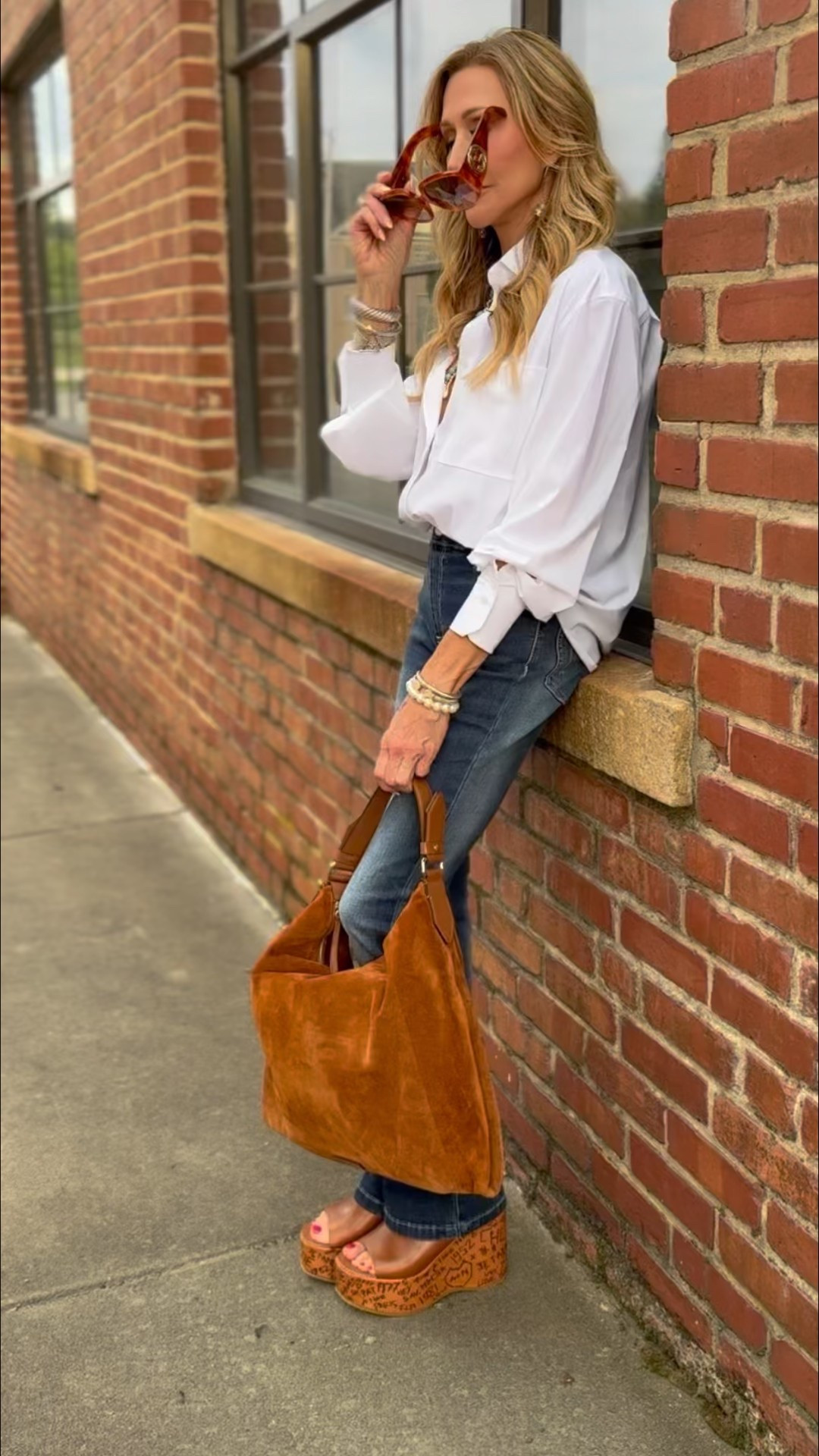 Lysse New York done right!  Perfect way to elevate jeans and a white blouse!  Add a statement necklace, sky high wedges and a fabulous suede bag!


#LTKSeasonal #LTKShoeCrush #LTKItBag
