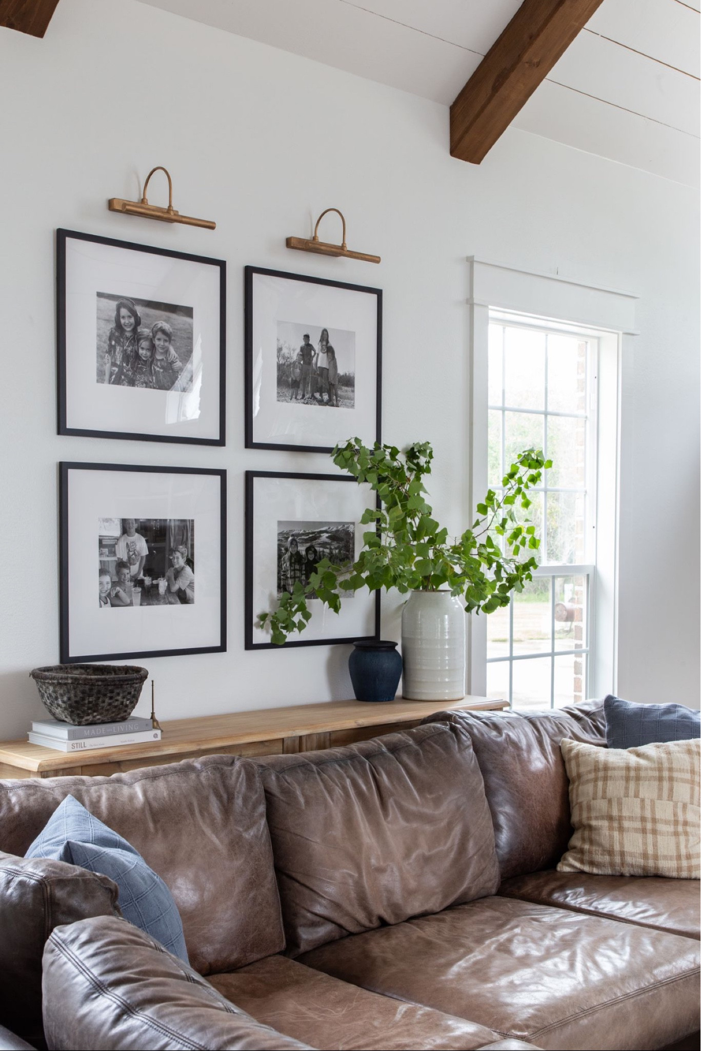 Gallery wall
Black & white photos
Library lights 
Console table

#LTKSeasonal #LTKhome