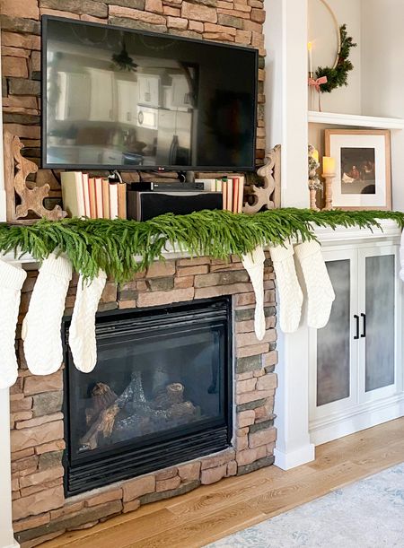 Norfolk pine garland Christmas stockings fireplace mantel decor studio McGee

#LTKSeasonal #LTKHoliday #LTKhome