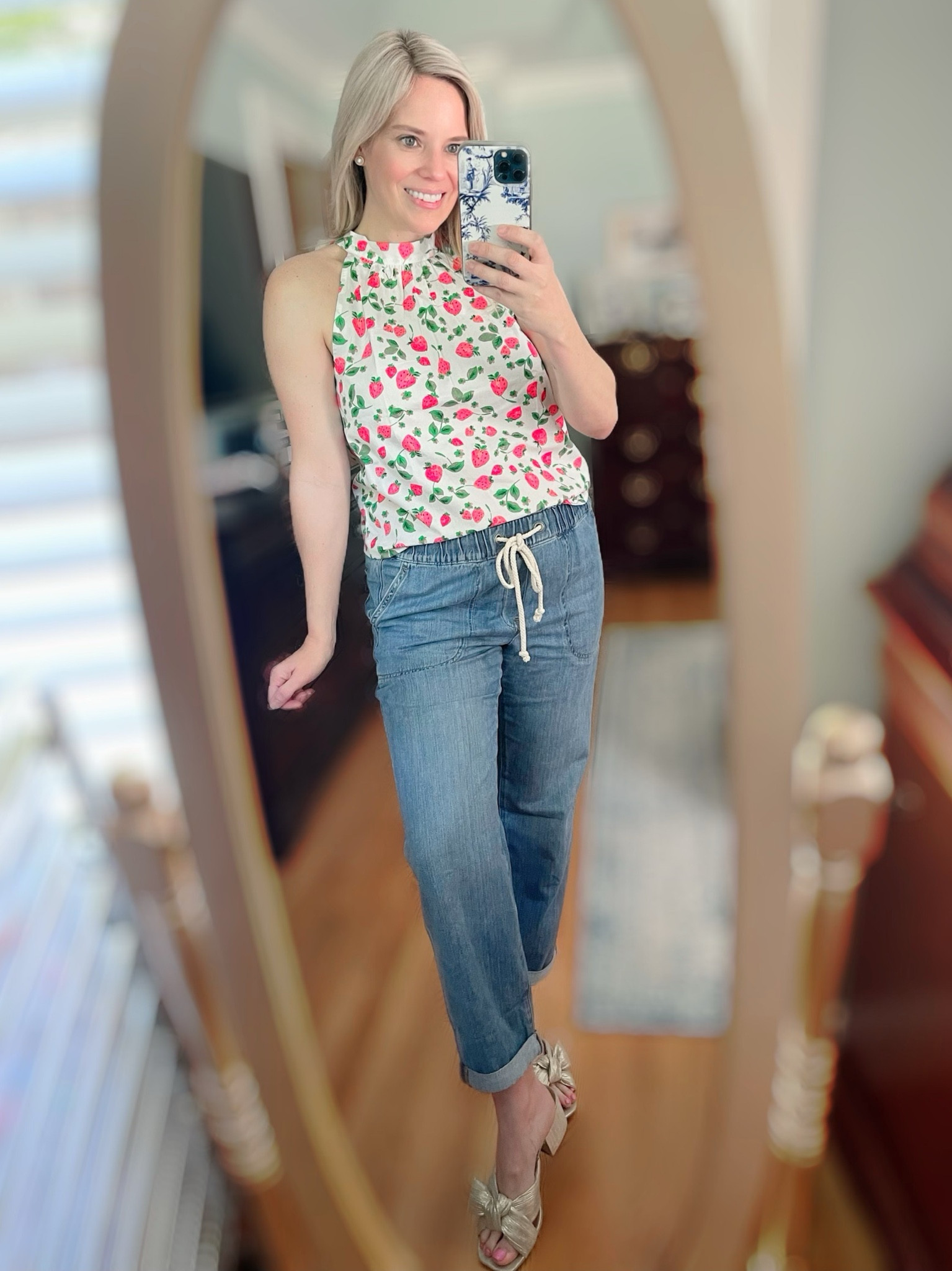 Strawberry print halter top, drawstring jeans, elastic waist jeans, gold sandals, summer outfits for moms, postpartum outfits 

#LTKfindsunder100 #LTKover40 #LTKfindsunder50