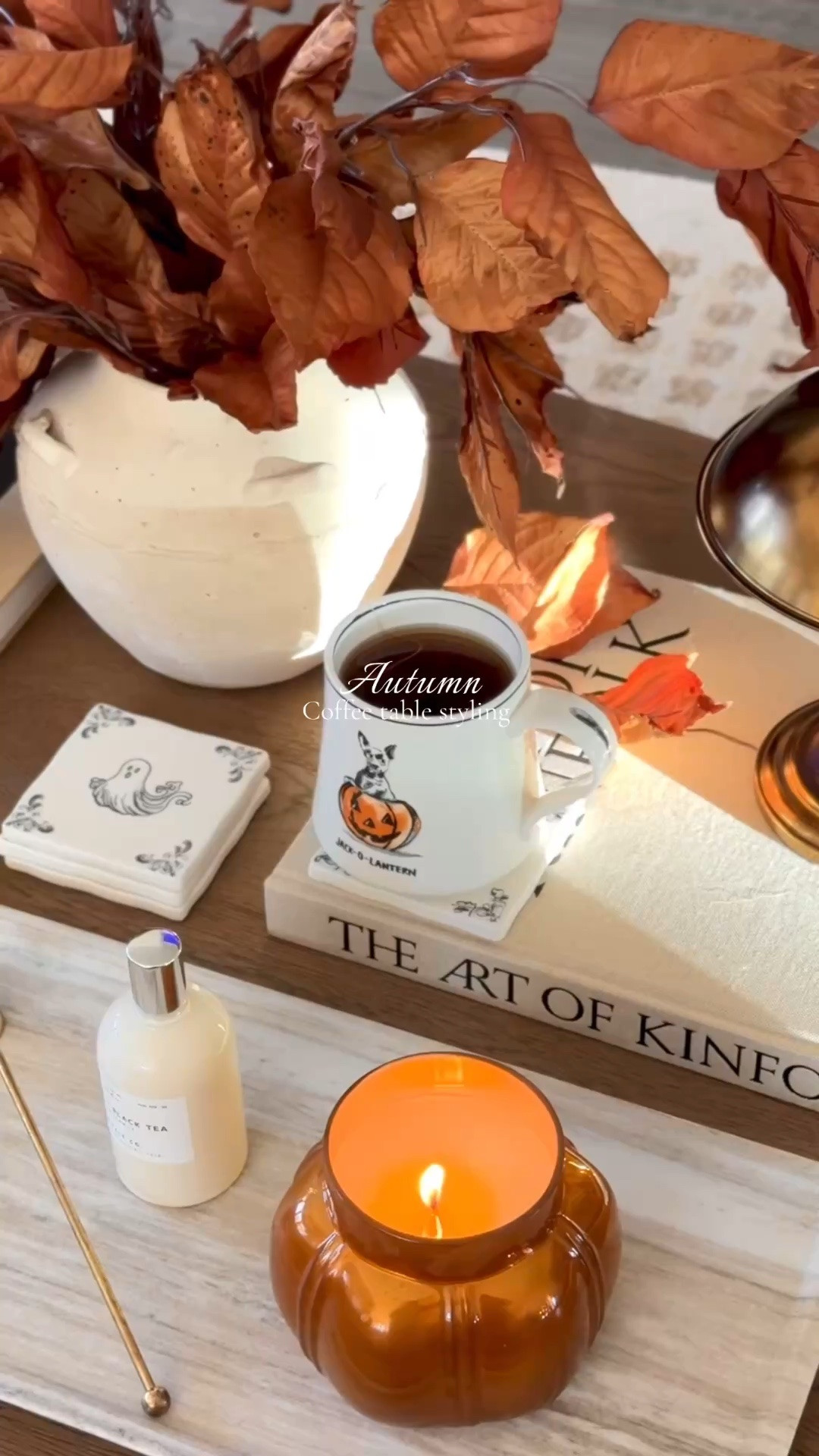 Fall coffee table styling with my favorite autumnal stems & the cutest Halloween coasters! 🎃👻🤎🍂

#LTKHome #LTKSaleAlert #LTKSeasonal