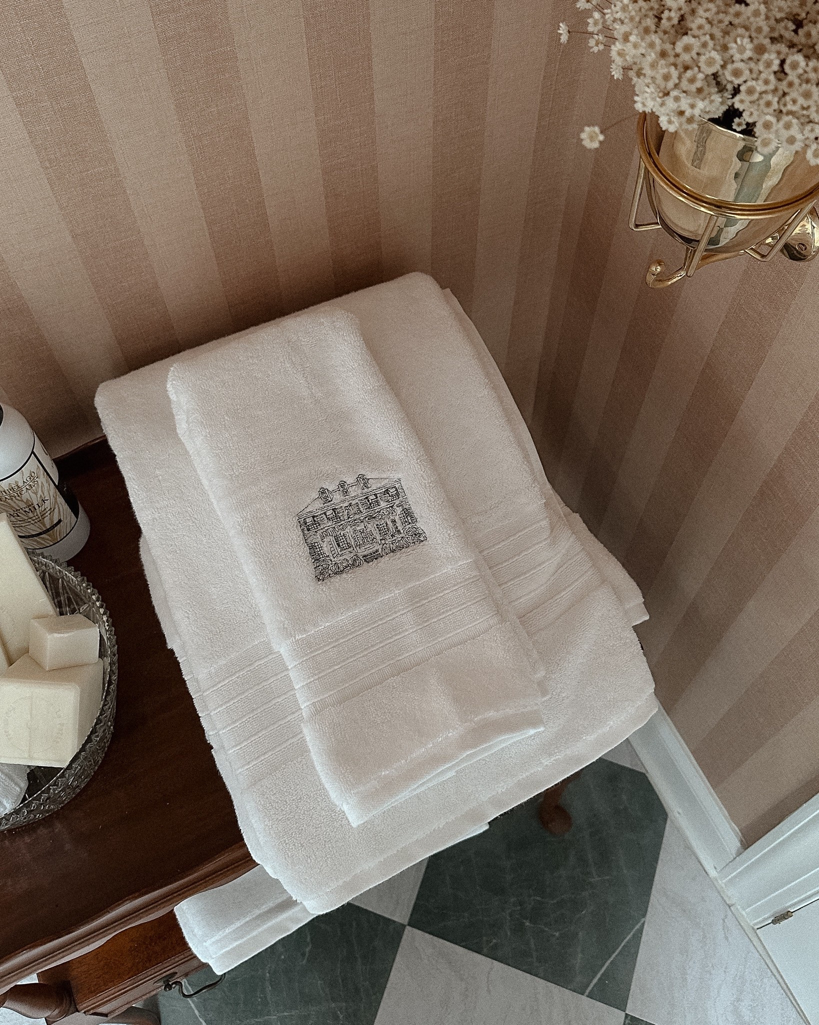 Embroidered towels in guest bathroom 🧶 

#LTKHome
