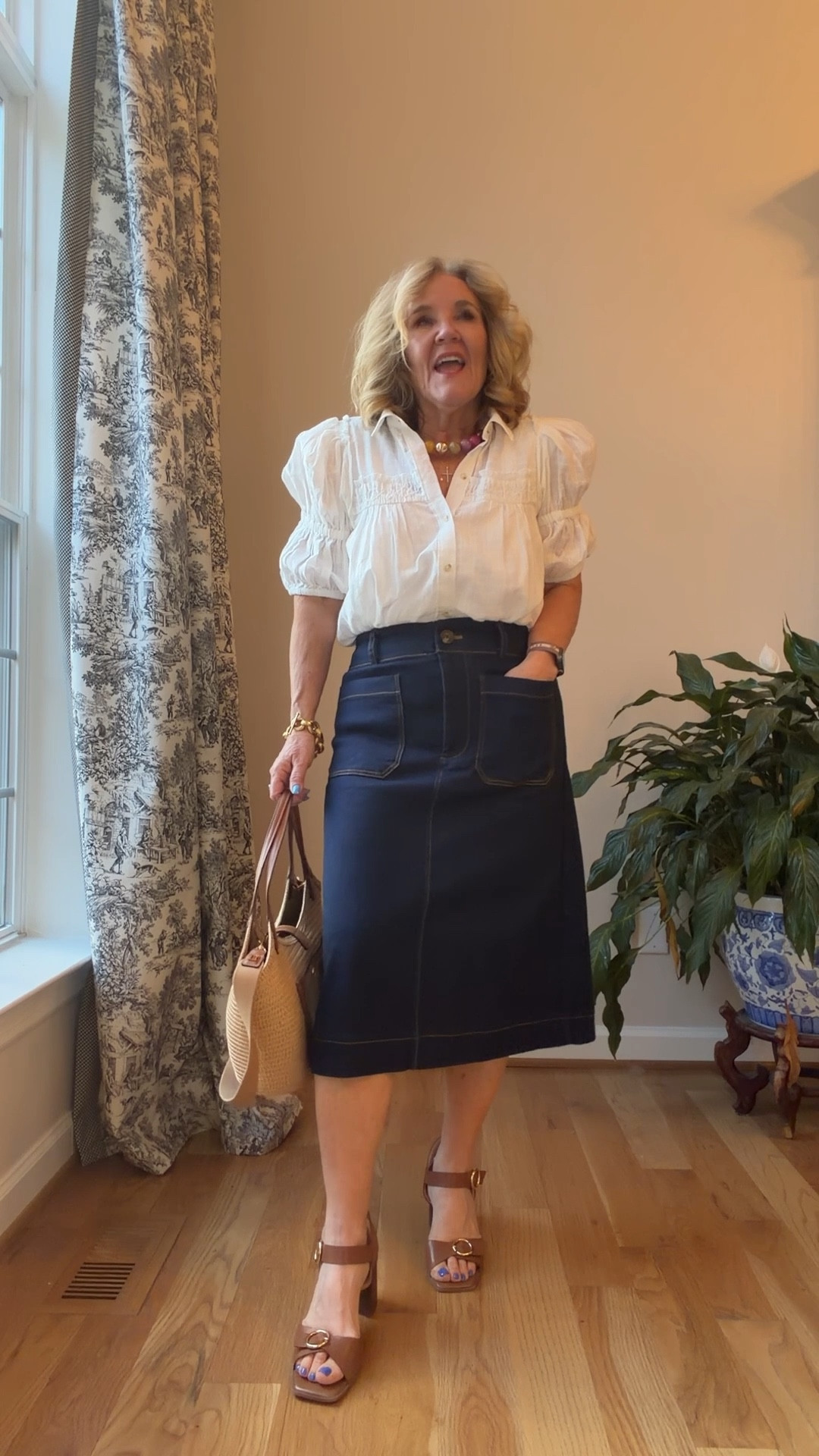 Colette denim skirt wearing a medium 
White blouse size medium. Apparently, some of the reviews say that this blouse is sheer. I would not call it here. I think either a simple Cami or nude bra might make you feel more comfortable.

Anthro 20% off code good until 3/9 NANETTE20

#LTKOver40 #LTKspring #LTKWorkwear