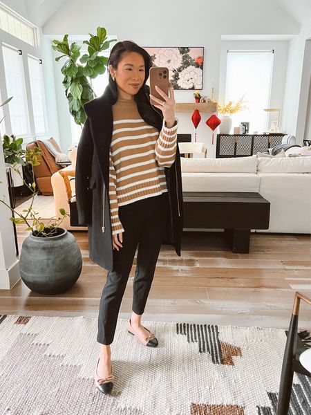 Work outfit for fall or winter with wardrobe staples on sale for 25% off with code SHOPNOW. Wearing a stripe roll neck sweater with black work pants that are stretchy and comfortable. This wool coat is a favorite of mine and so warm without being bulky. Wearing size XXS in the sweater, which has more of a classic fit. Wearing size petite 00 in the pants and zero in the coat. I sized up in the coat to make it maternity friendly for when I am pregnant. 

#LTKsalealert #LTKSeasonal #LTKworkwear