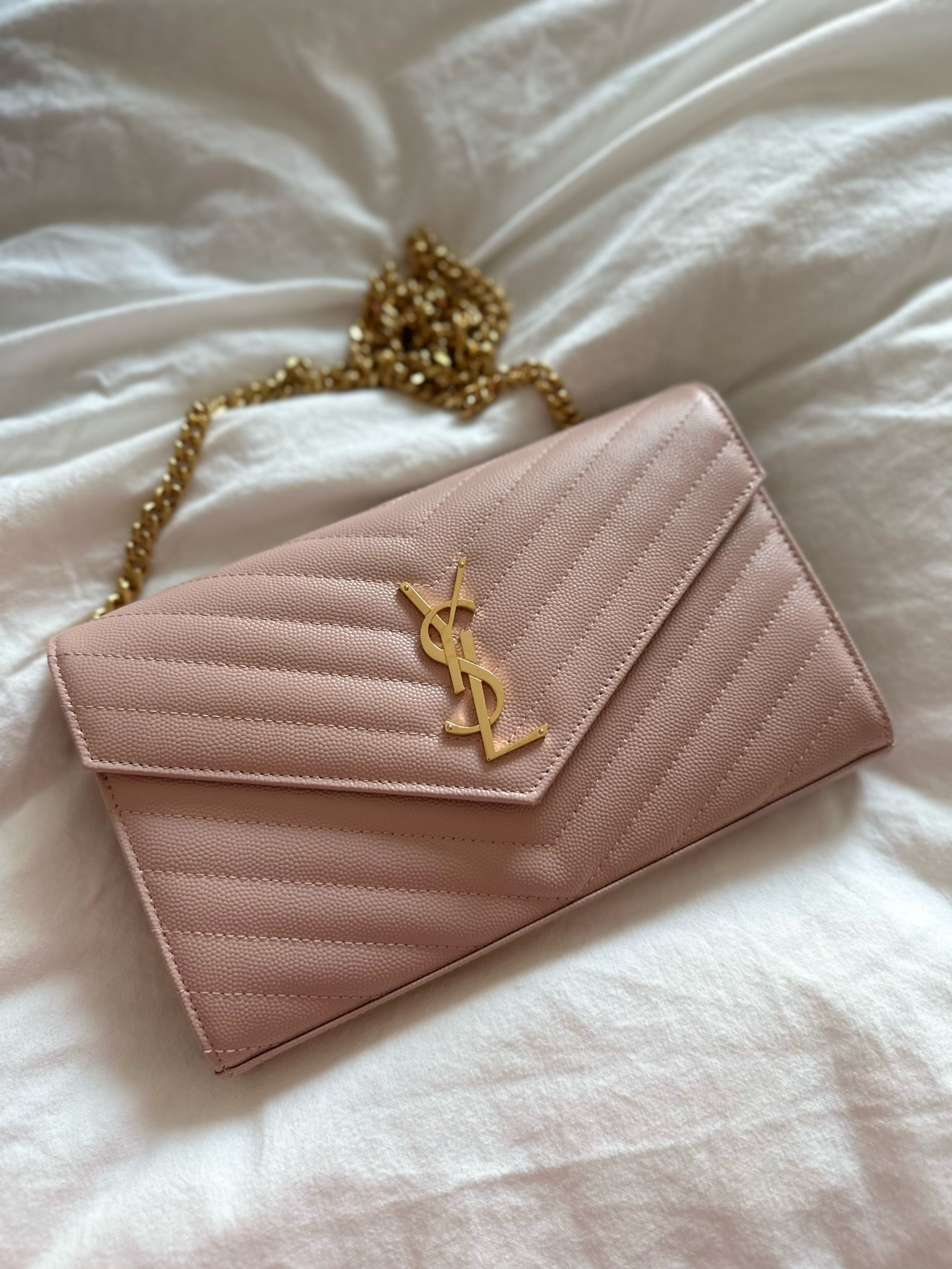 The newest member of my bag collection 🩷☺️ The Saint Laurent Cassandre wallet on a chain in light pink. I got her for a wedding later this month 🩷

#LTKItBag #LTKWedding #LTKSeasonal