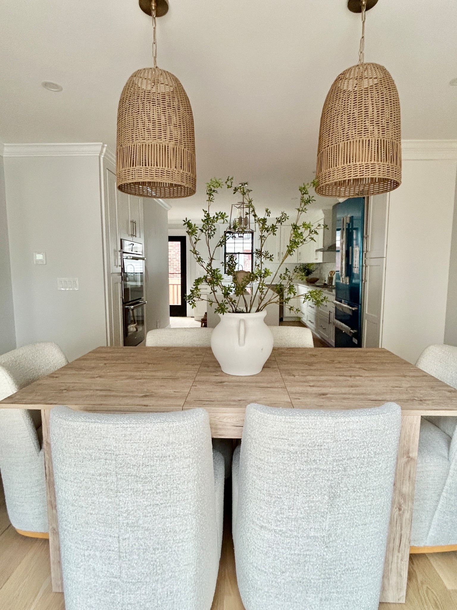 Coastal dining room vibes. 
Dining chairs, dining table, pendants and table decor.

#diningroomdecor

#LTKHome